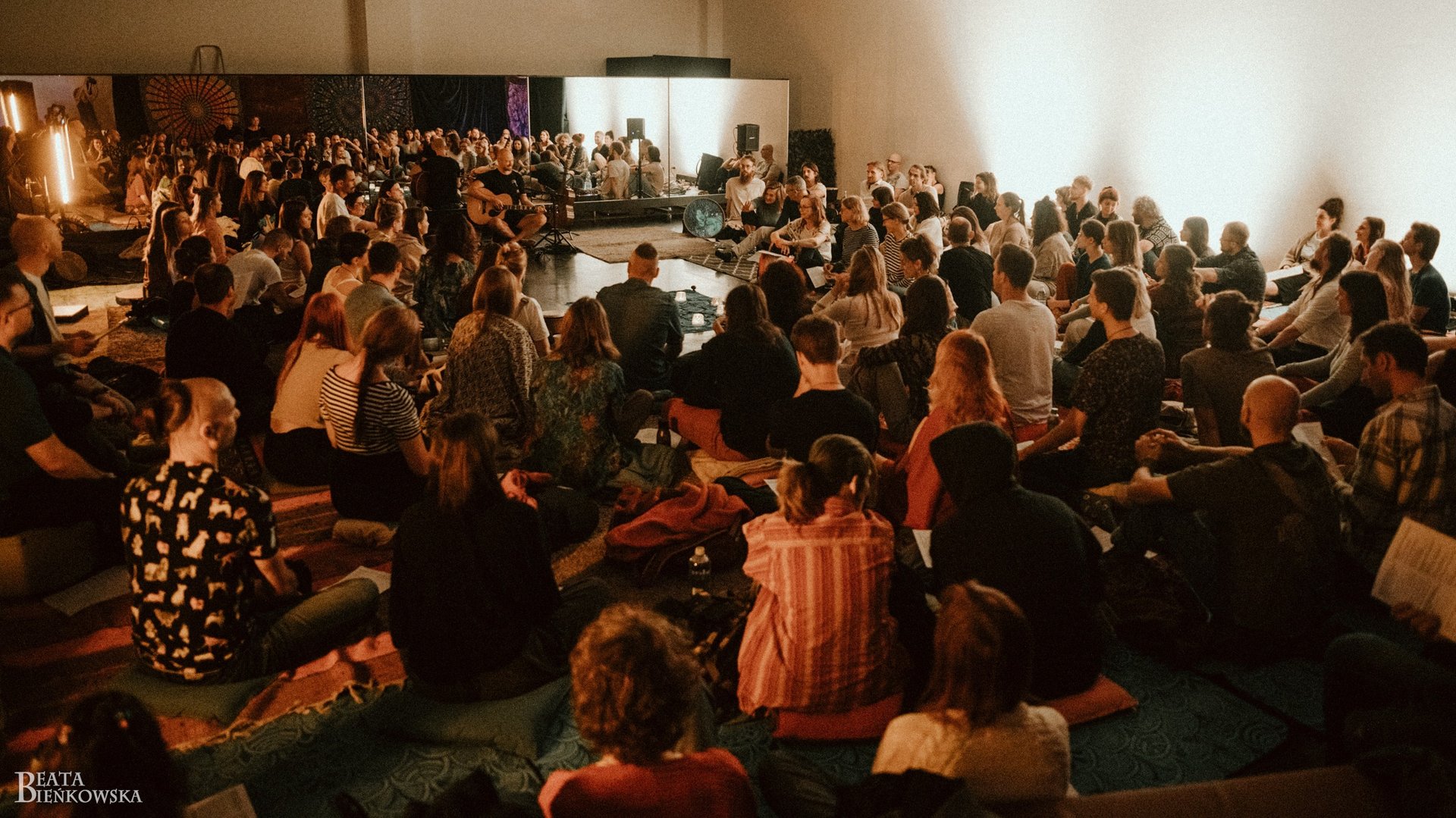 a blurry photo of a group of people dancing