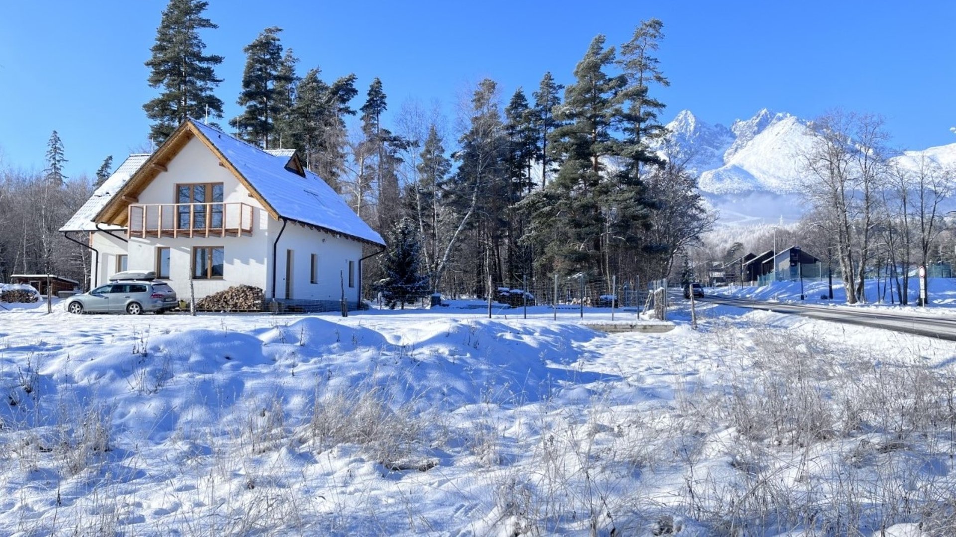woman wearing yellow long-sleeved dress under white clouds and blue sky during daytime