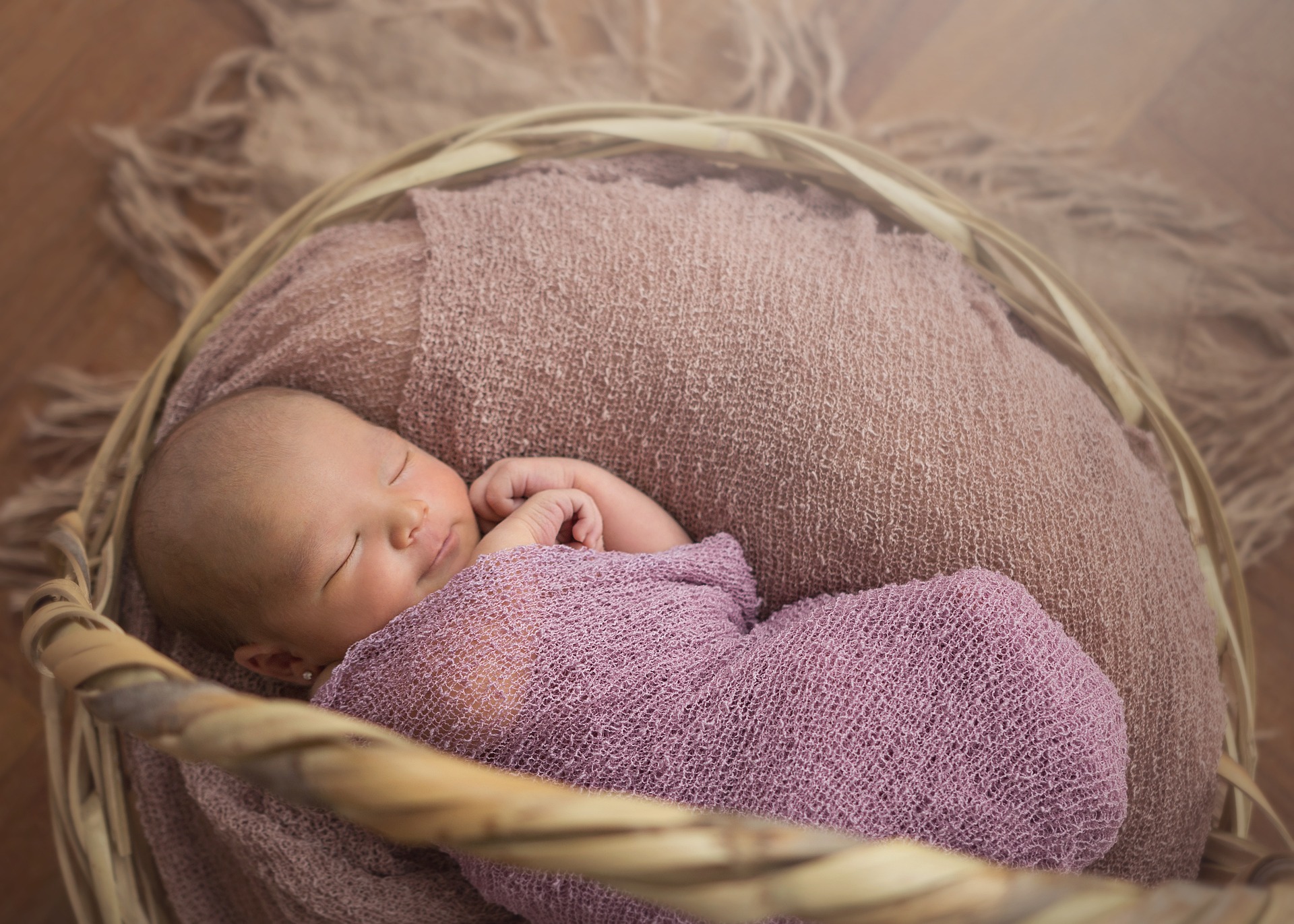 baby lying on inflatable ring