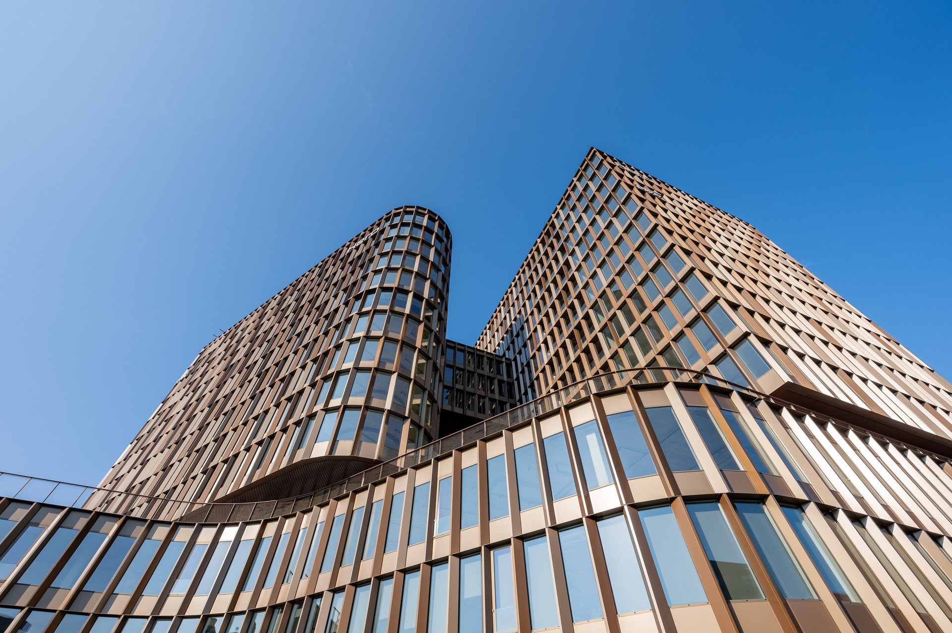 black and brown leather padded tub sofa