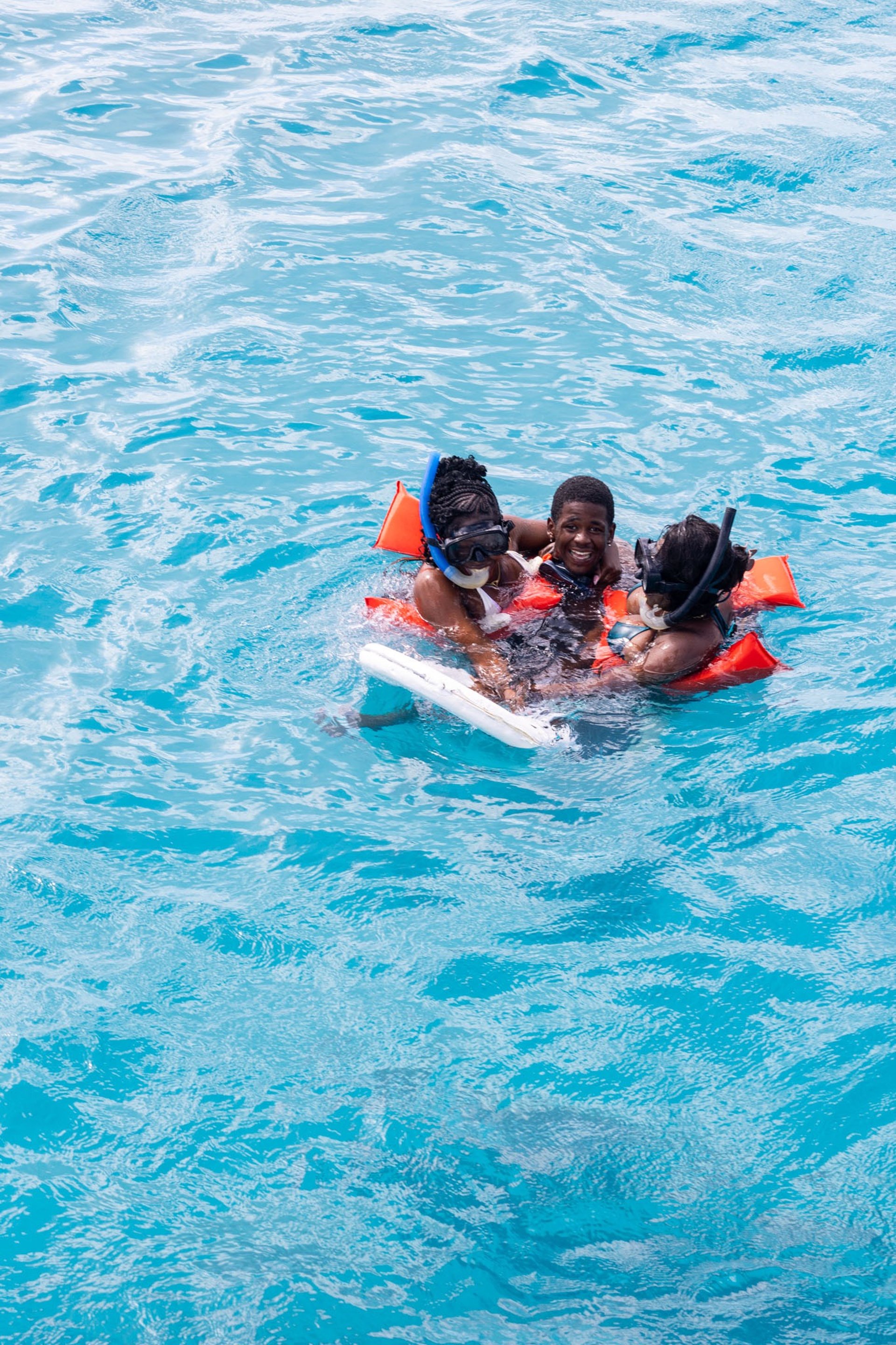 an abstract photo of a curved building with a blue sky in the background