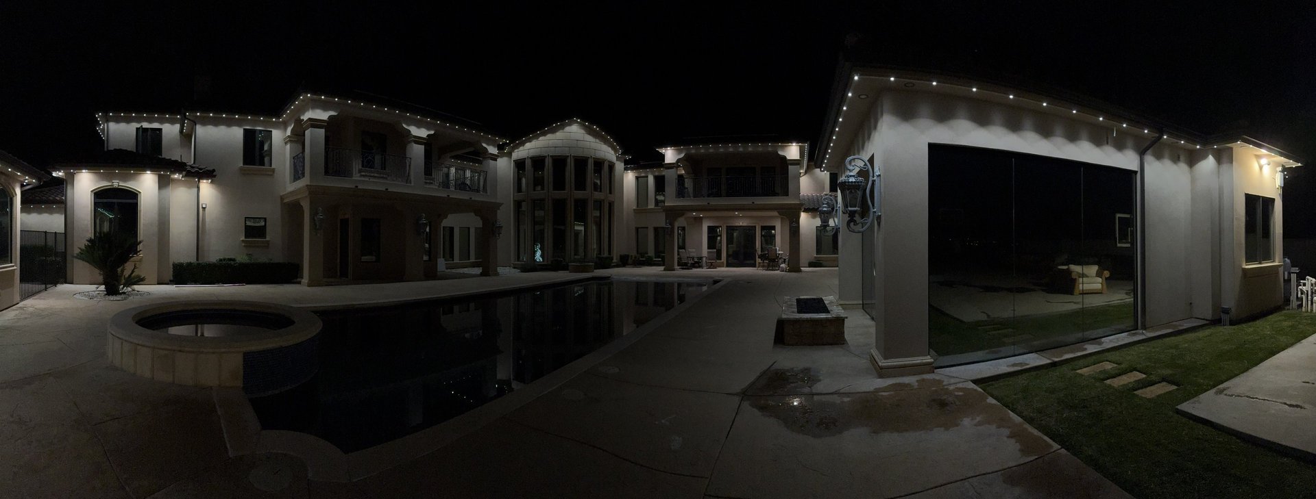 an abstract photo of a curved building with a blue sky in the background