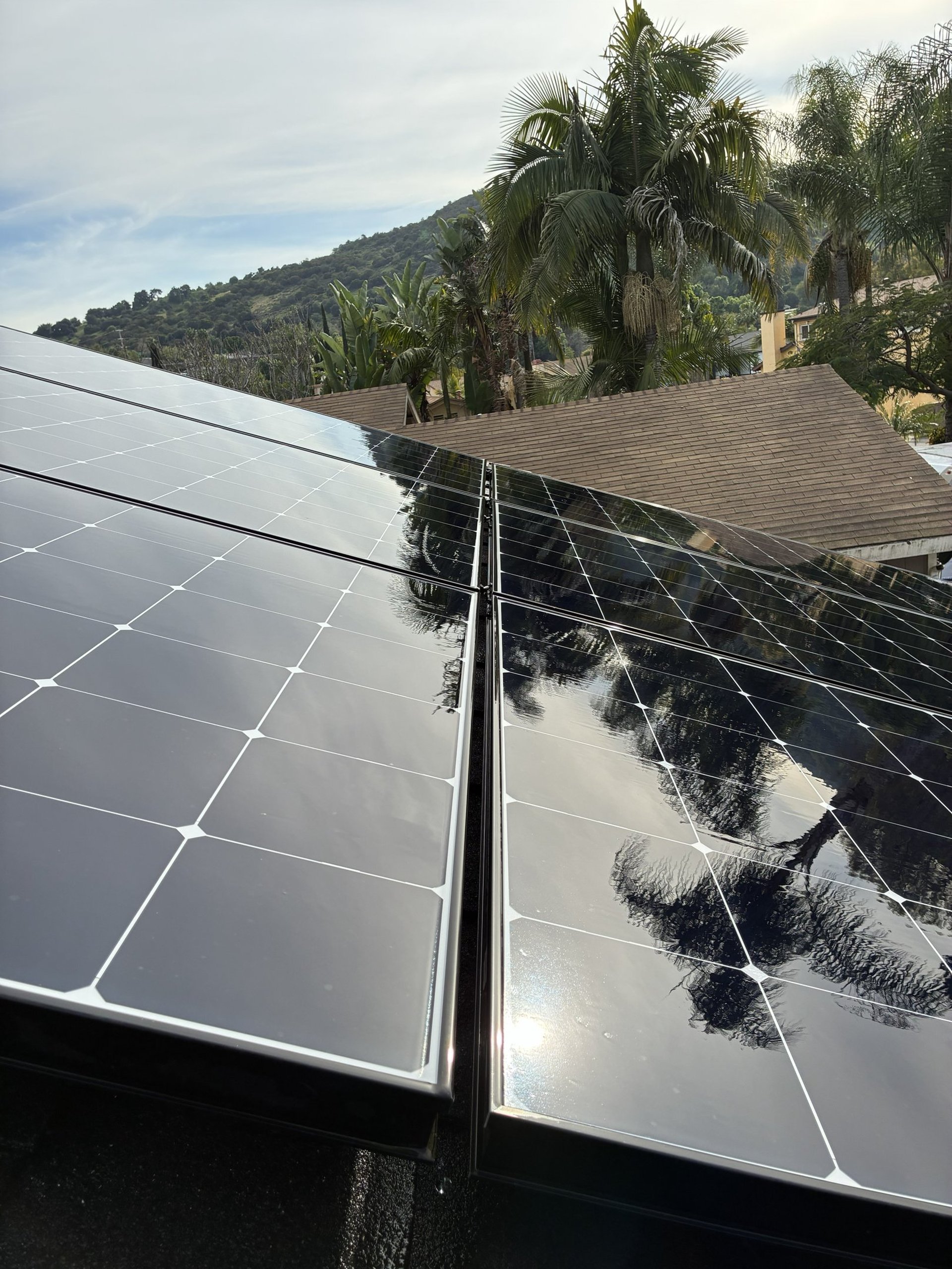 an abstract photo of a curved building with a blue sky in the background