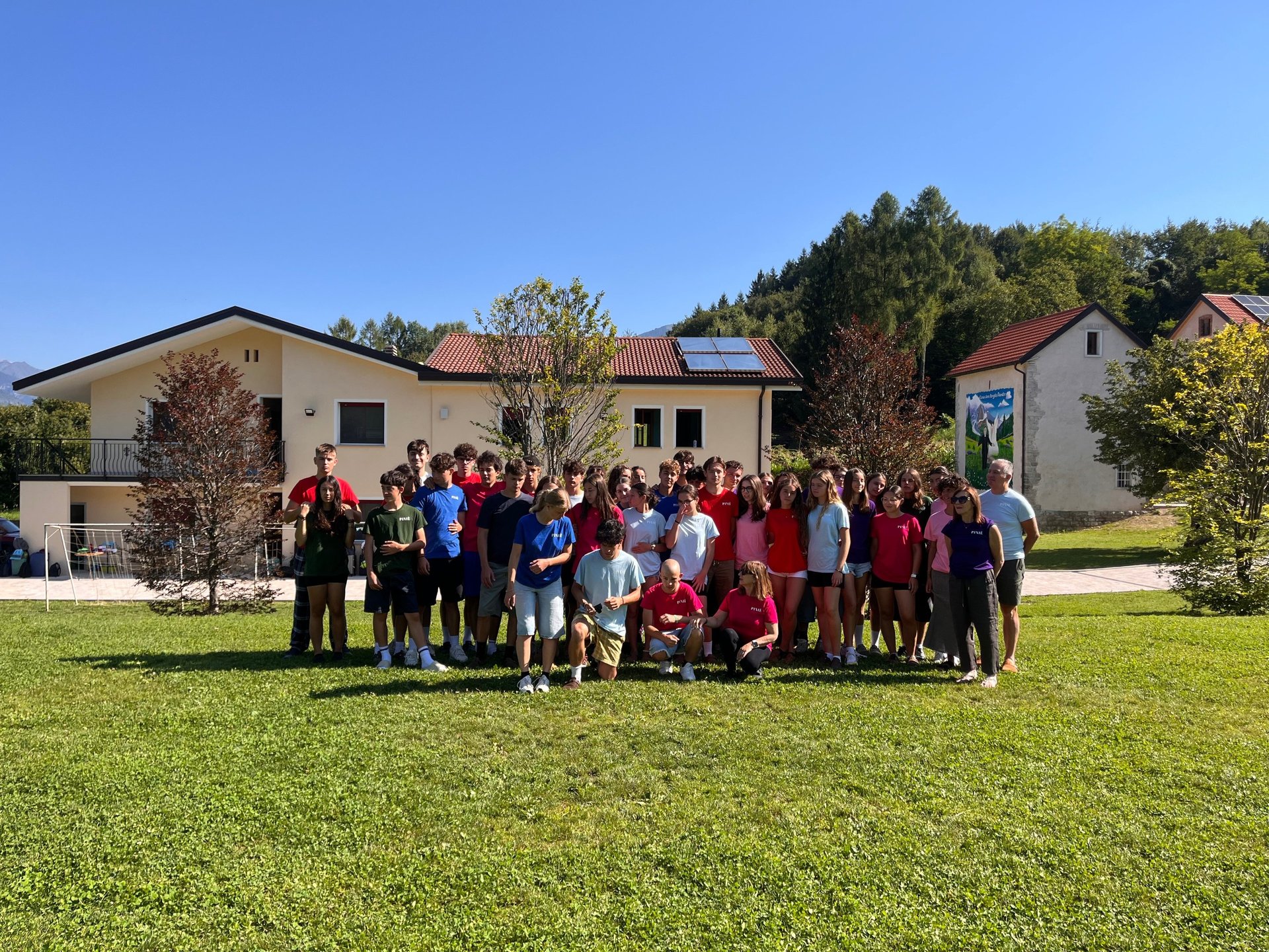 a group of people hiking up a snow covered mountain