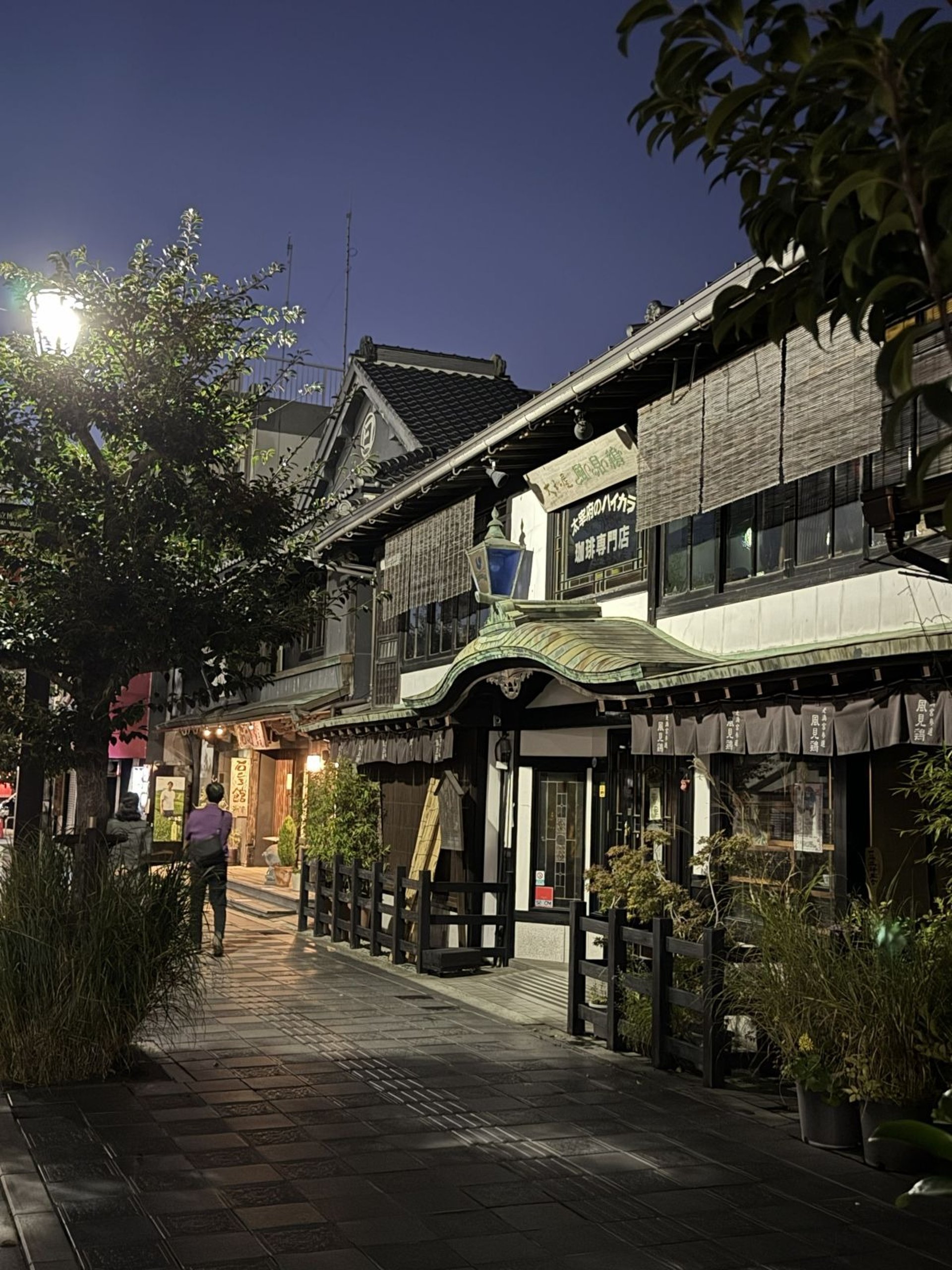 The traditional shopping street leading to Dazaifu Tenmangu after sunset.