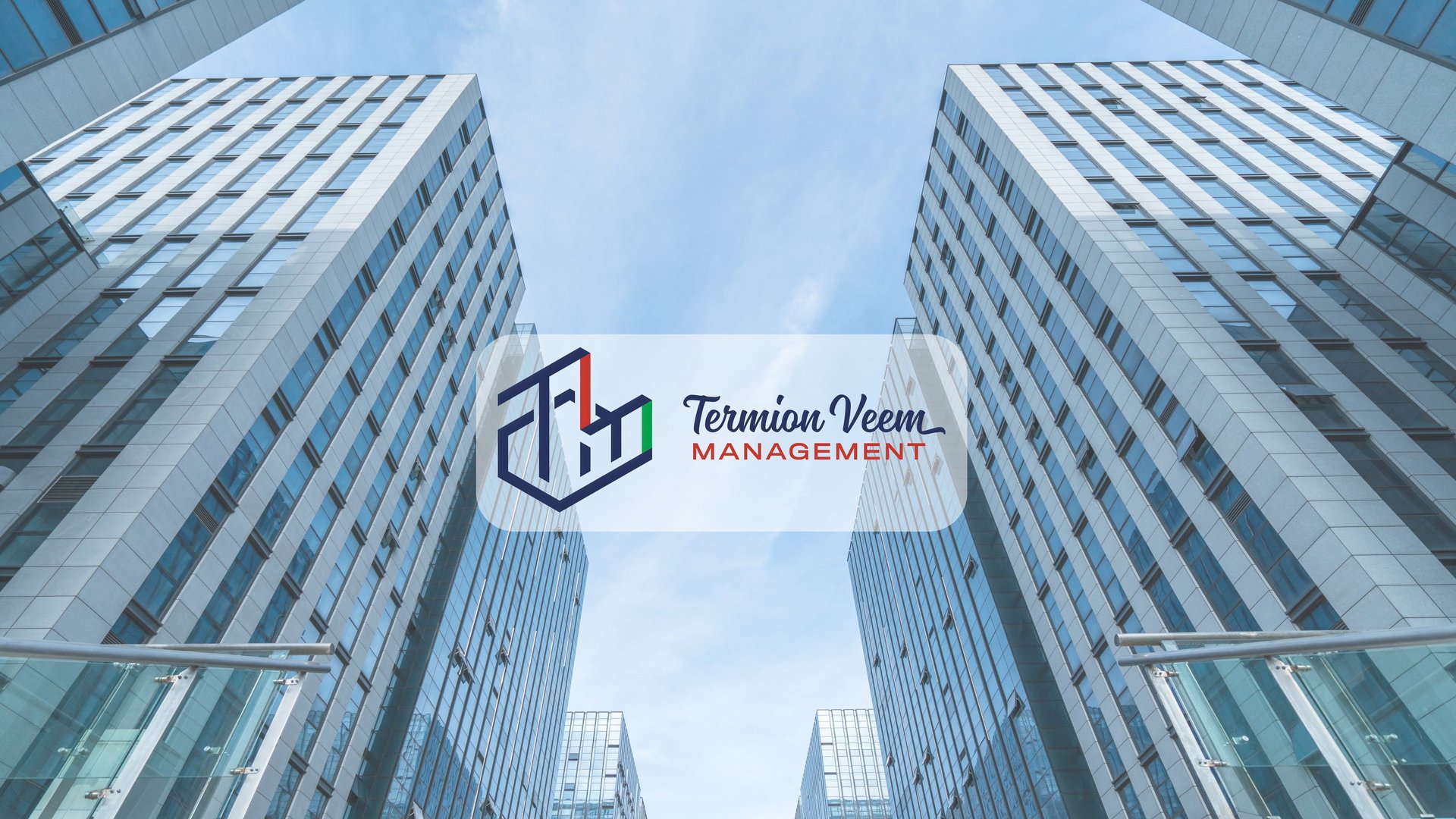 man and woman standing in front of brown concrete building during daytime