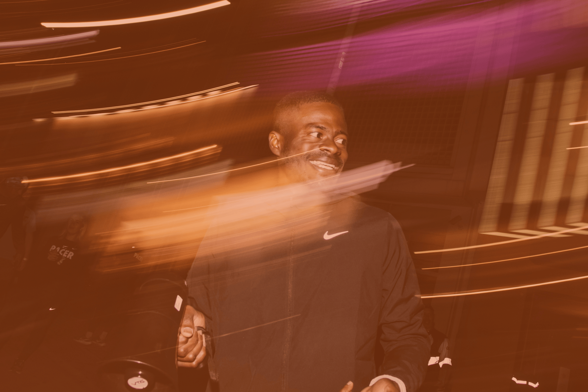 an abstract photo of a curved building with a blue sky in the background