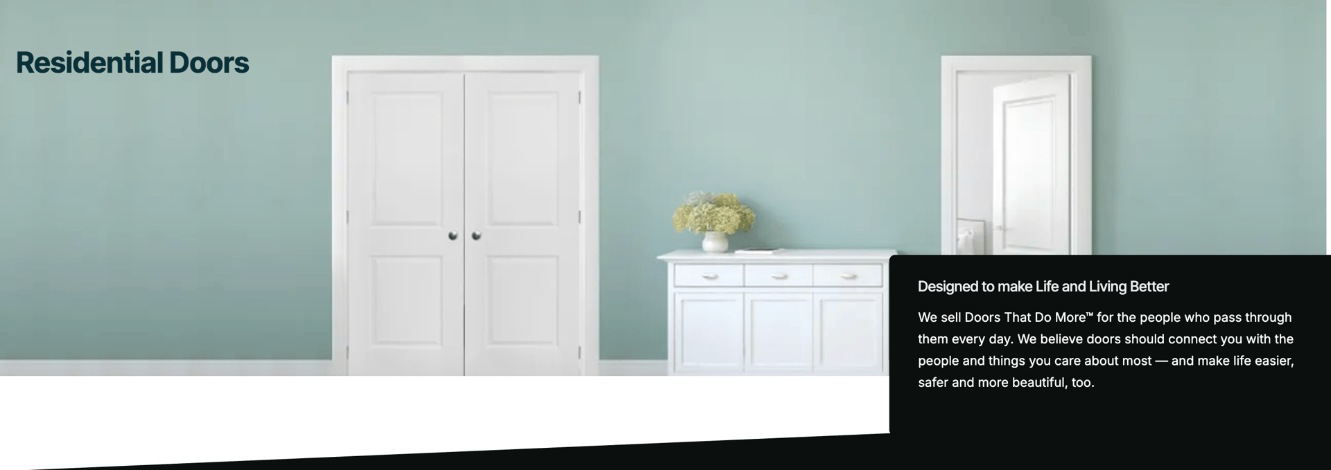 an abstract photo of a curved building with a blue sky in the background