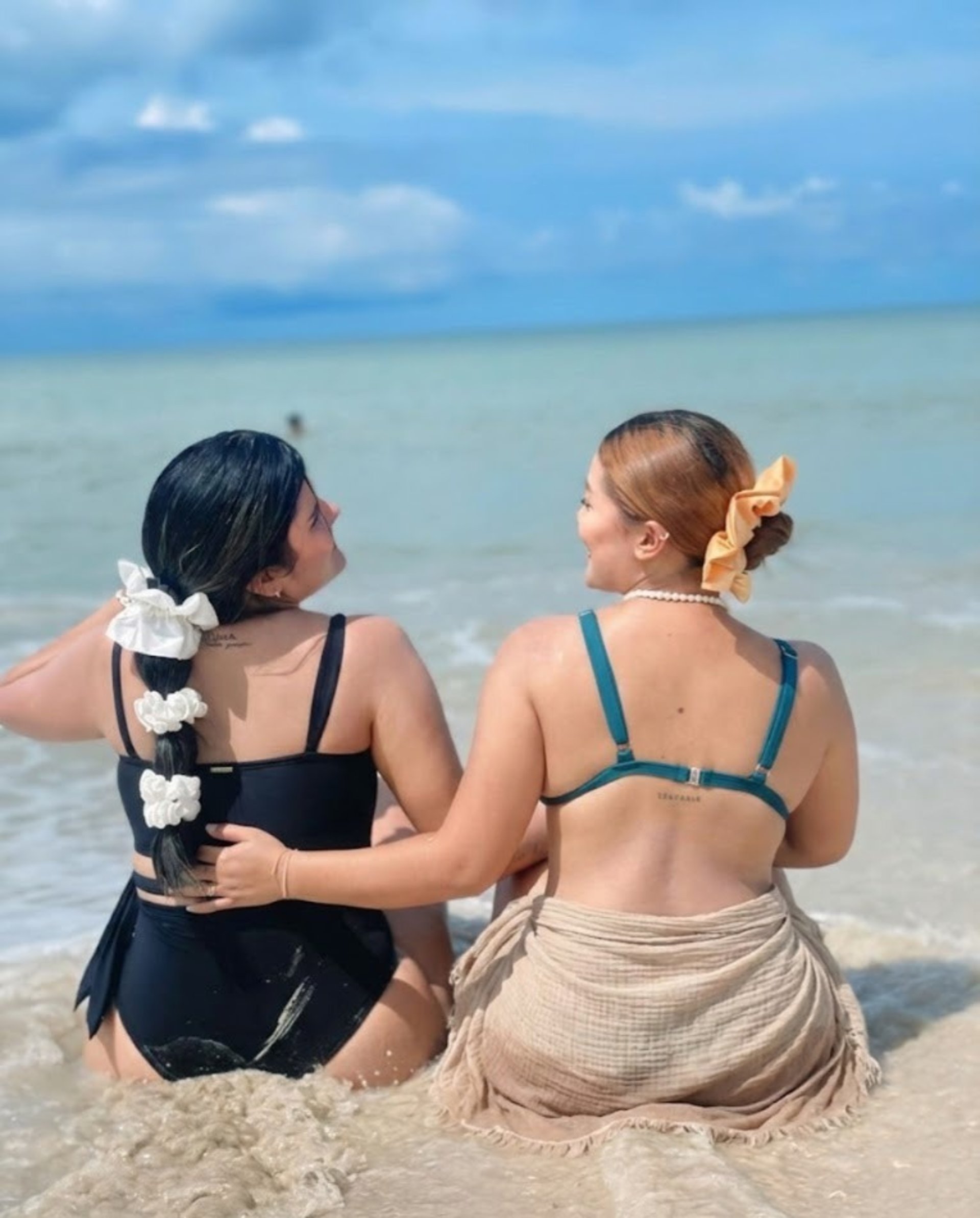 person wearing grey knit sweater