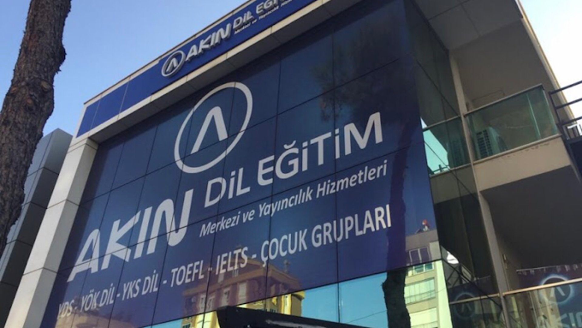 woman wearing yellow long-sleeved dress under white clouds and blue sky during daytime