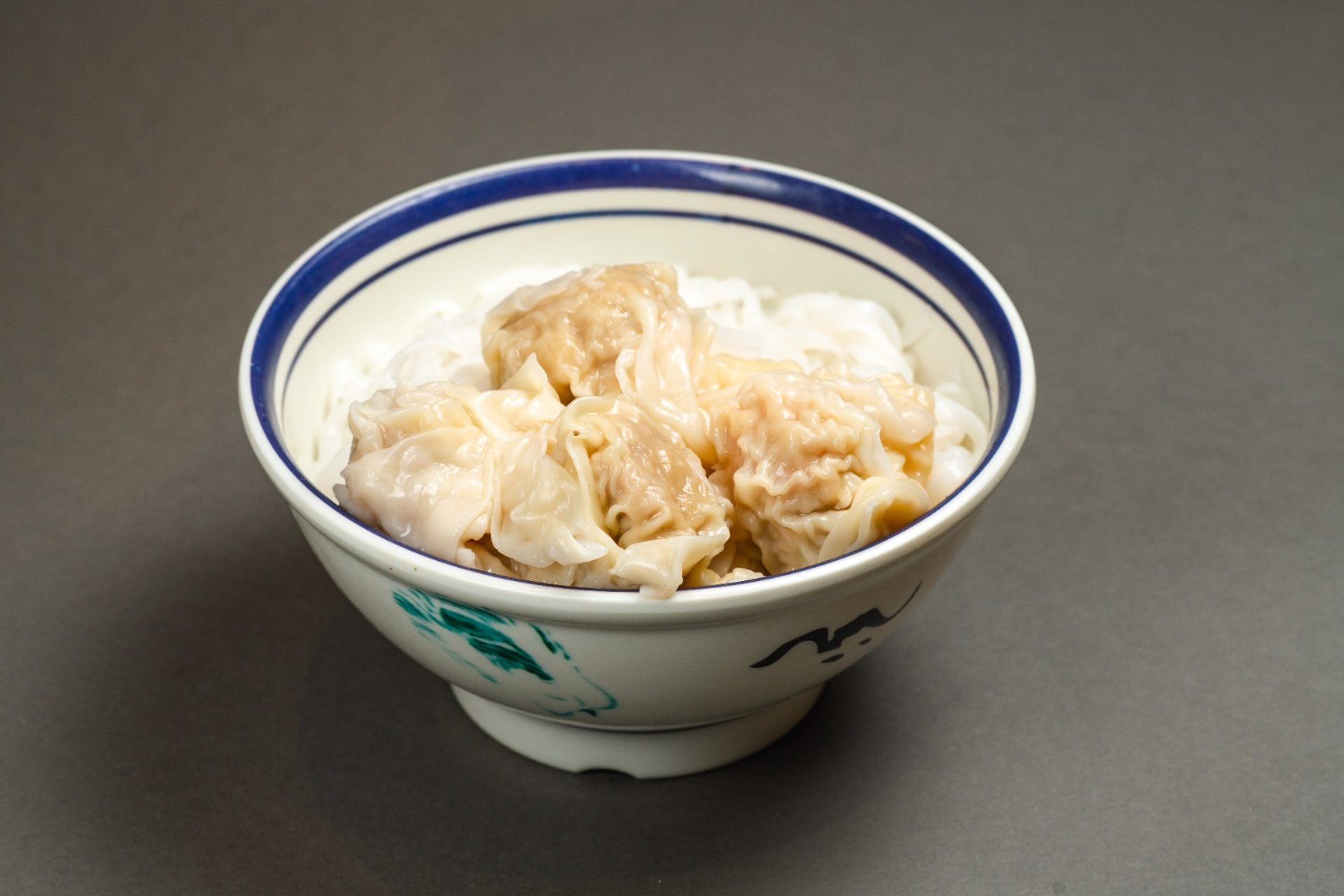 white textile on brown wooden table