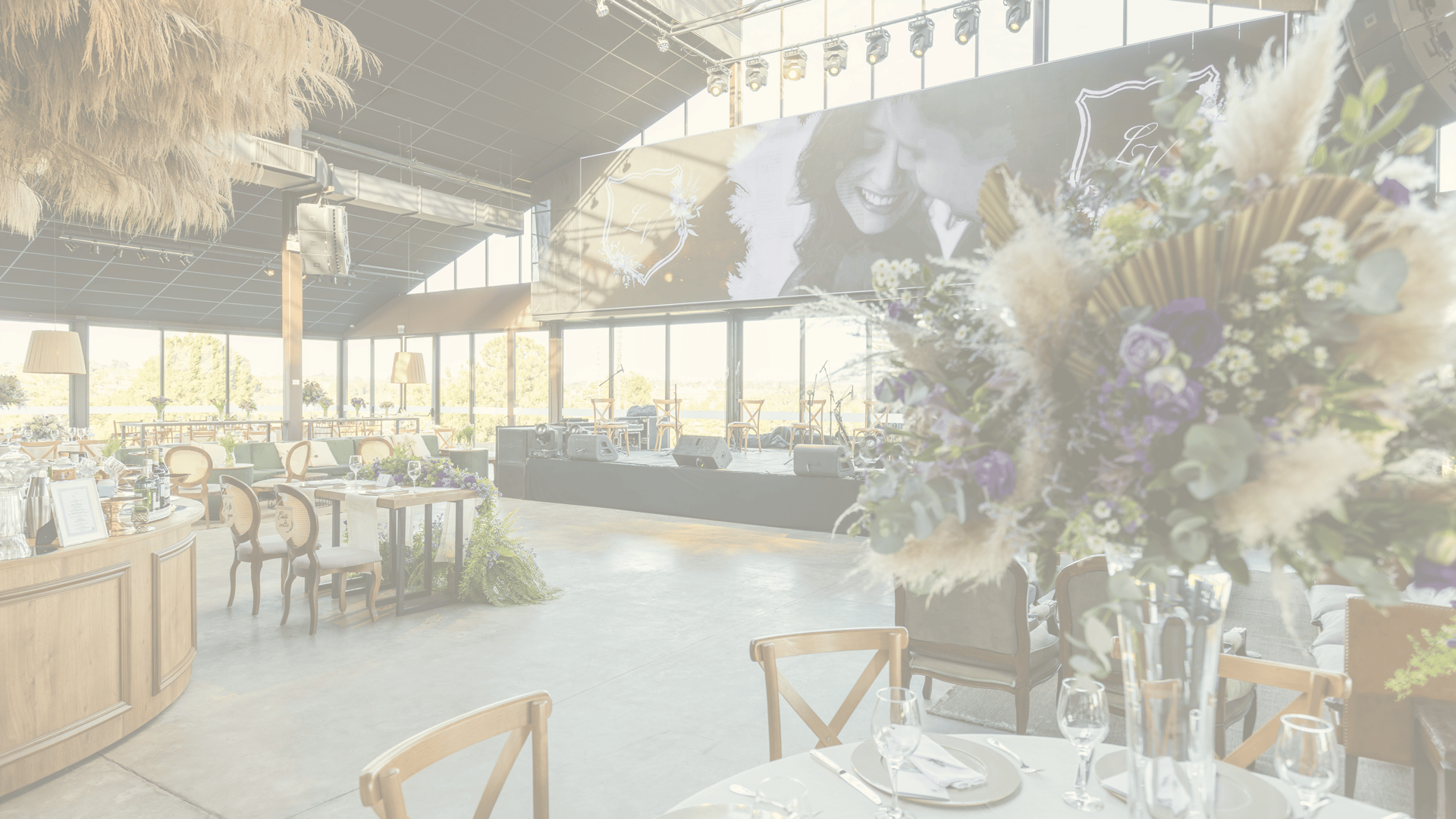 an abstract photo of a curved building with a blue sky in the background