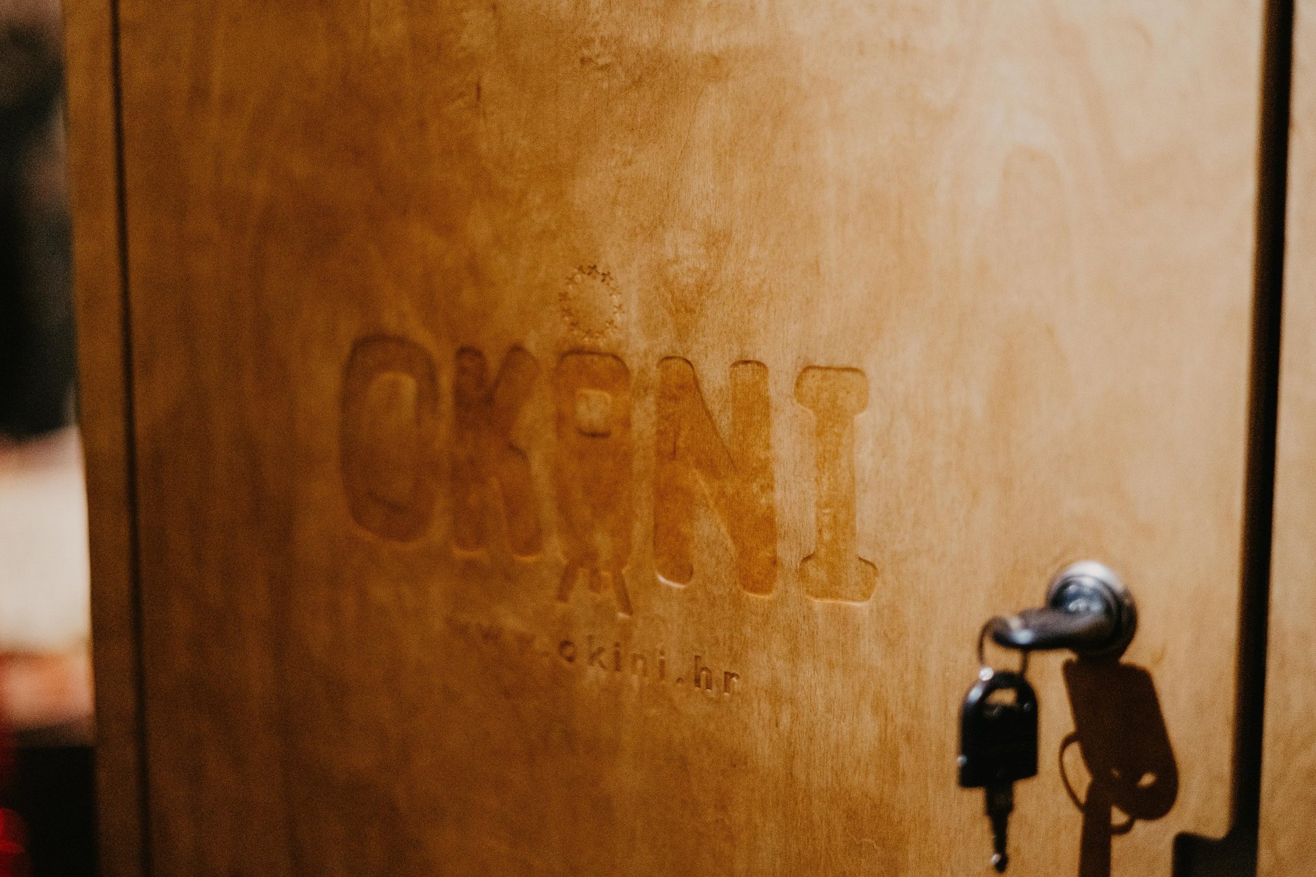 an abstract photo of a curved building with a blue sky in the background