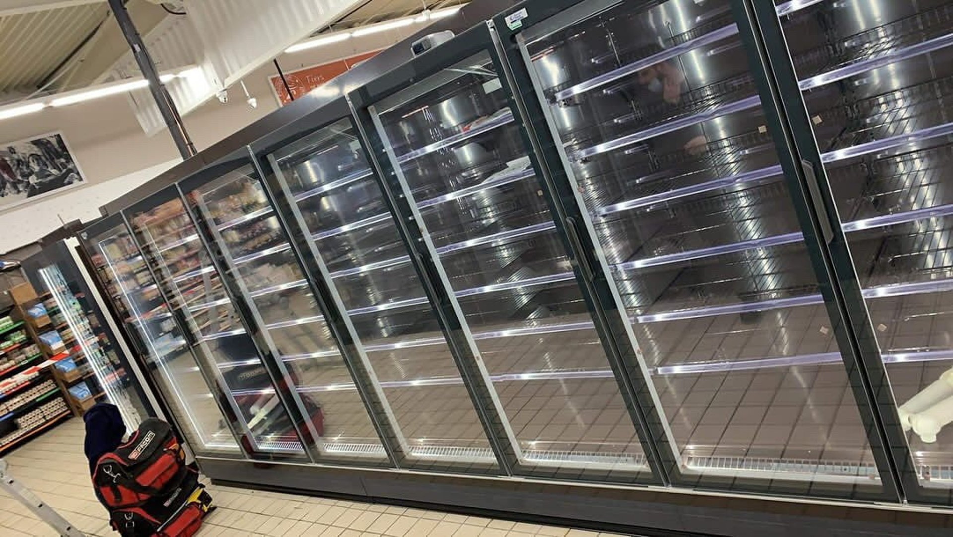 woman wearing yellow long-sleeved dress under white clouds and blue sky during daytime