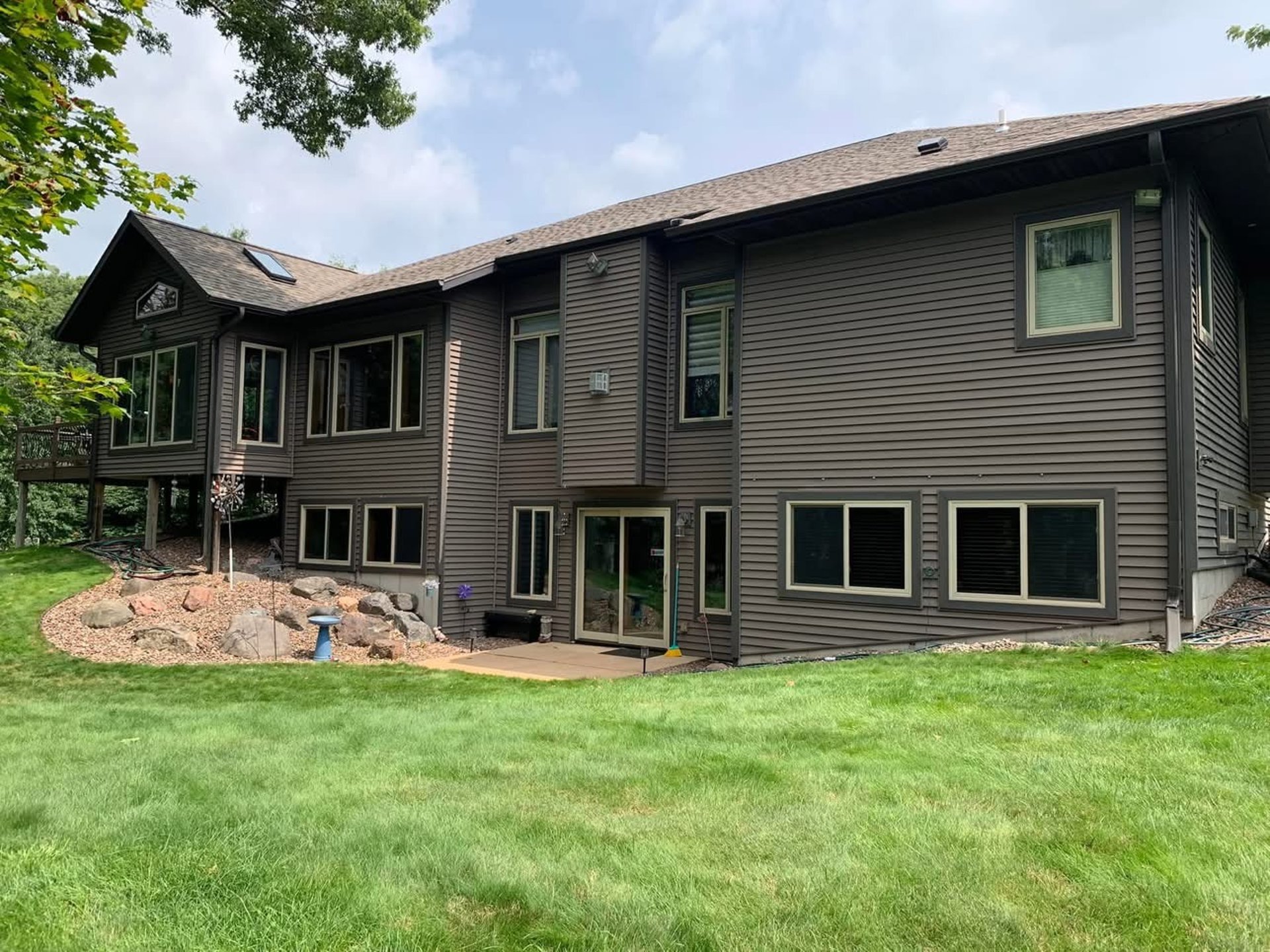 brown and white concrete house under blue sky during daytime