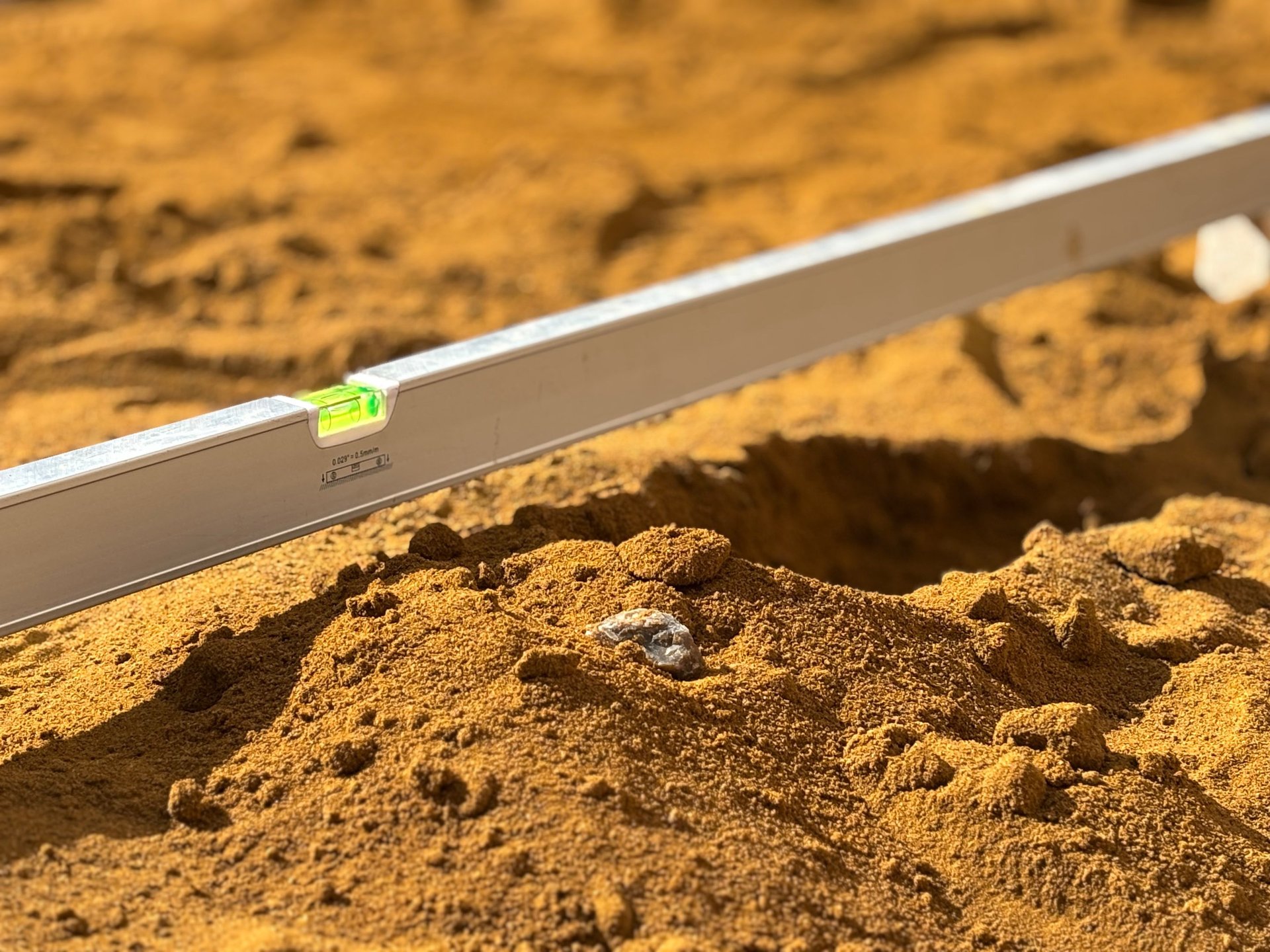 woman wearing yellow long-sleeved dress under white clouds and blue sky during daytime