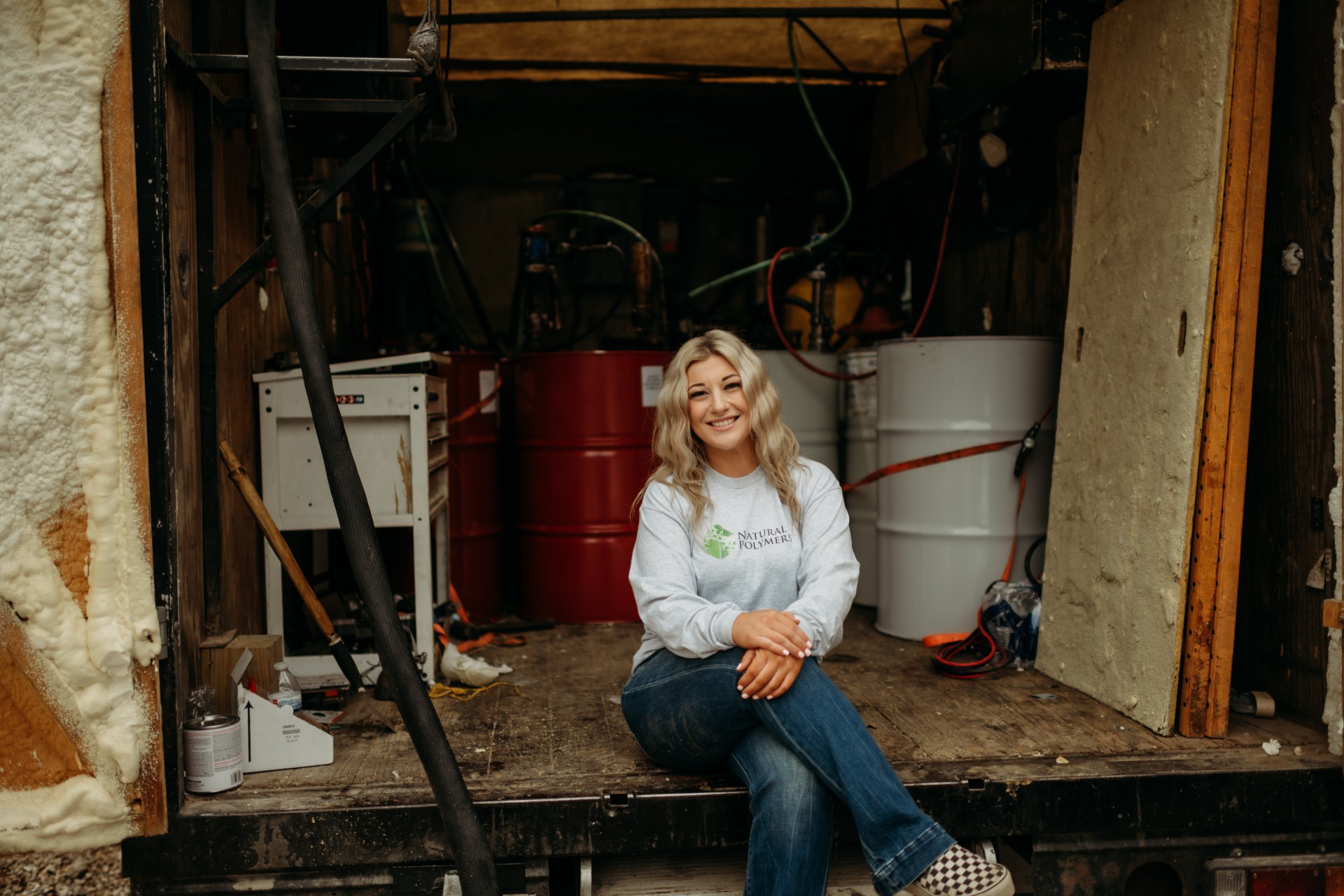 black and brown leather padded tub sofa