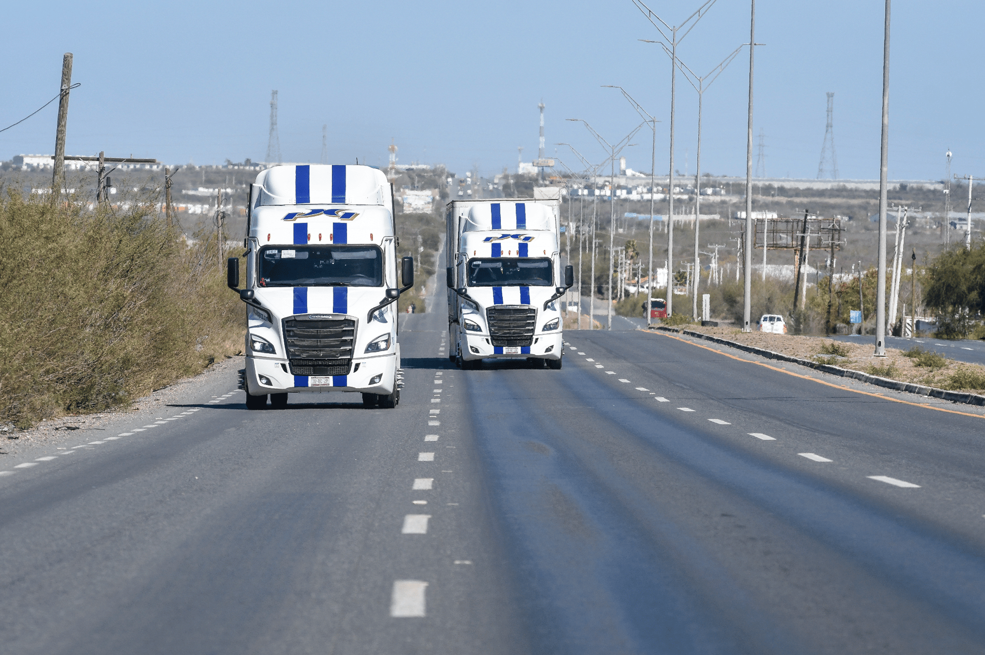woman wearing yellow long-sleeved dress under white clouds and blue sky during daytime