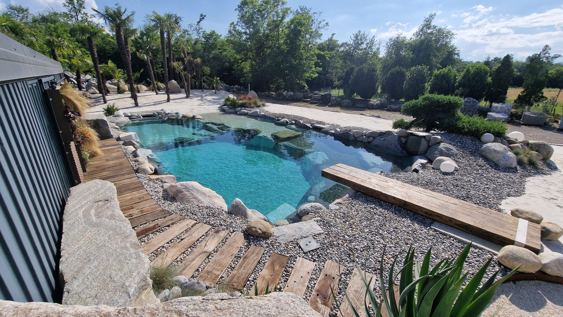 a modern house with a pool in front of it