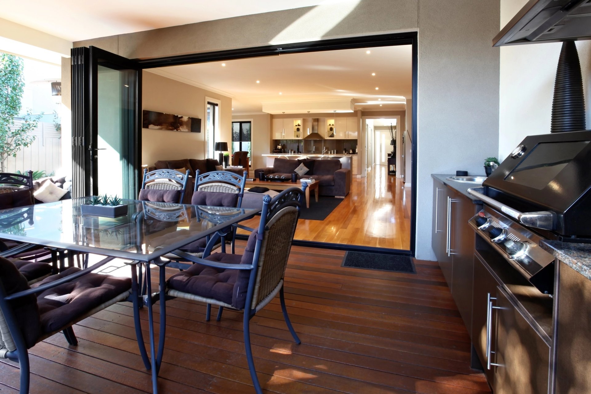 an abstract photo of a curved building with a blue sky in the background