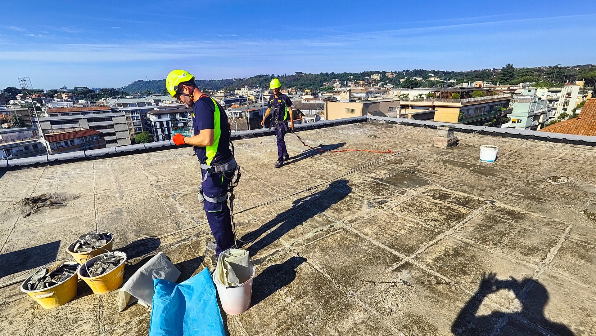 an abstract photo of a curved building with a blue sky in the background