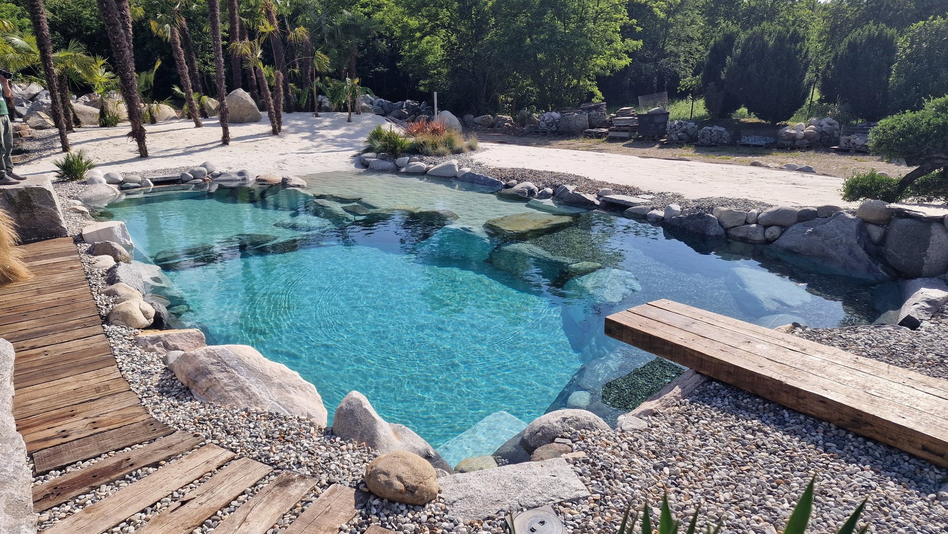 a modern house with a pool in front of it
