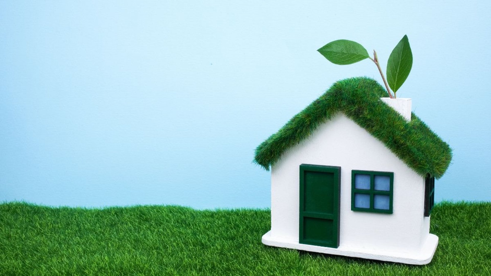 an abstract photo of a curved building with a blue sky in the background