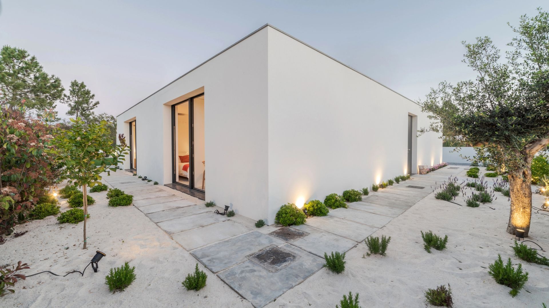 an abstract photo of a curved building with a blue sky in the background