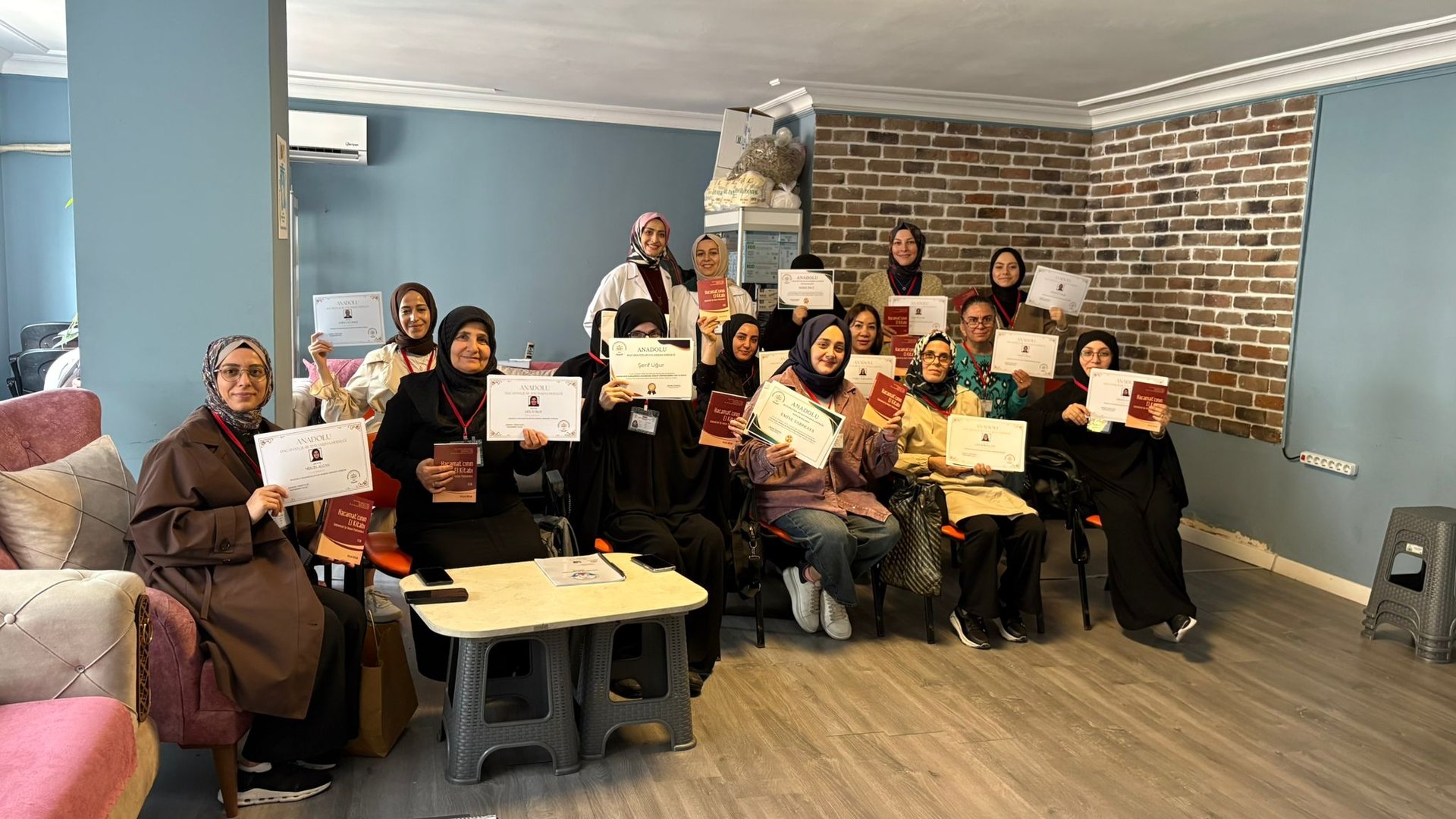 black and brown leather padded tub sofa