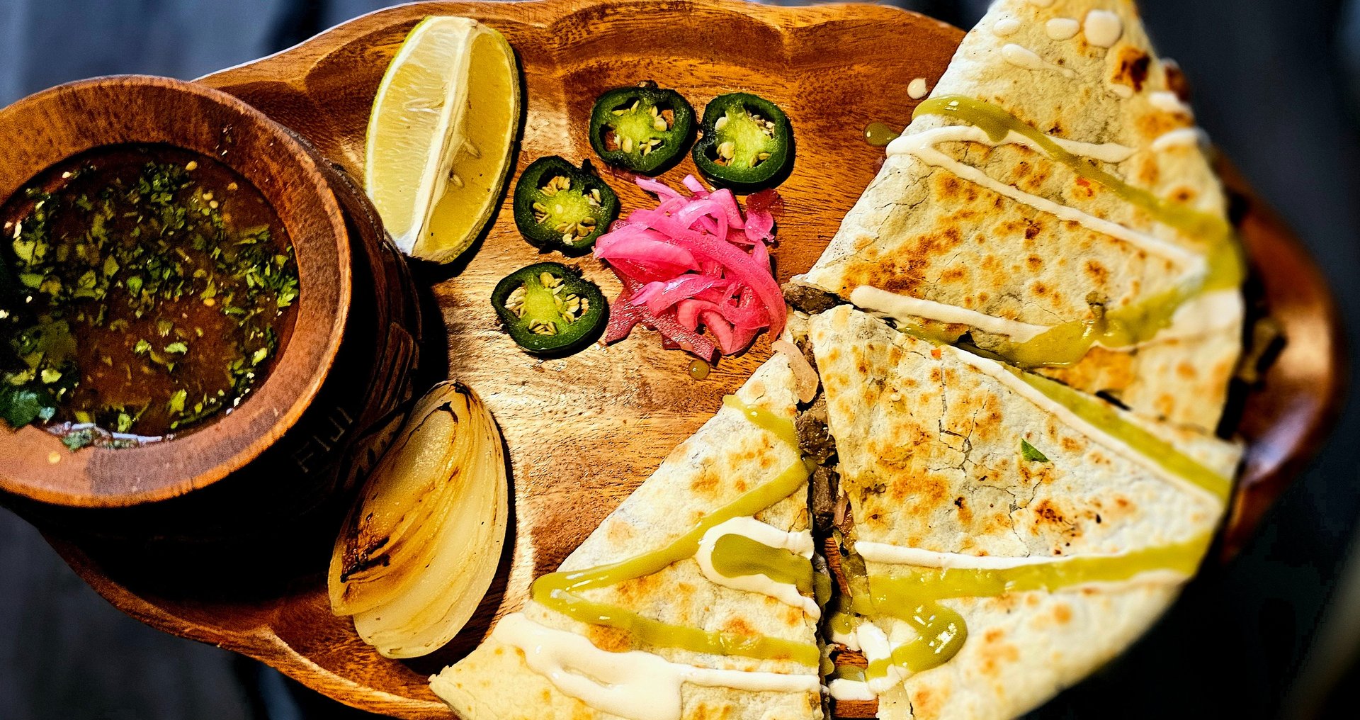 black and brown leather padded tub sofa