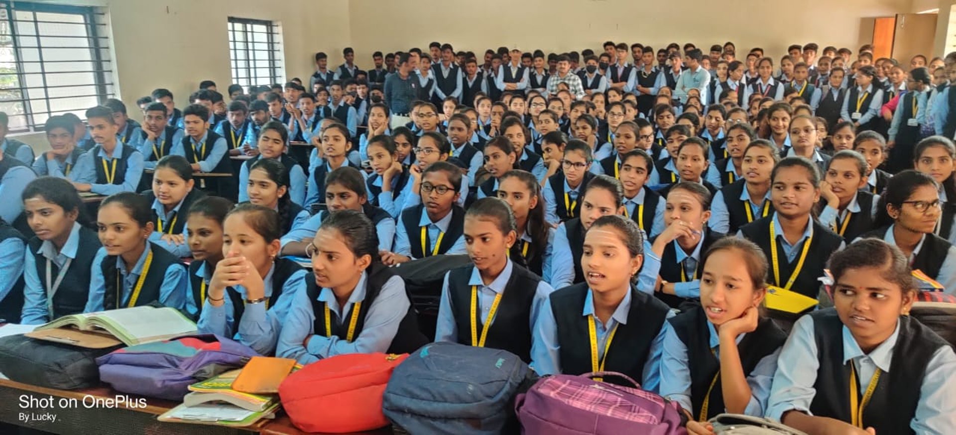 woman wearing yellow long-sleeved dress under white clouds and blue sky during daytime