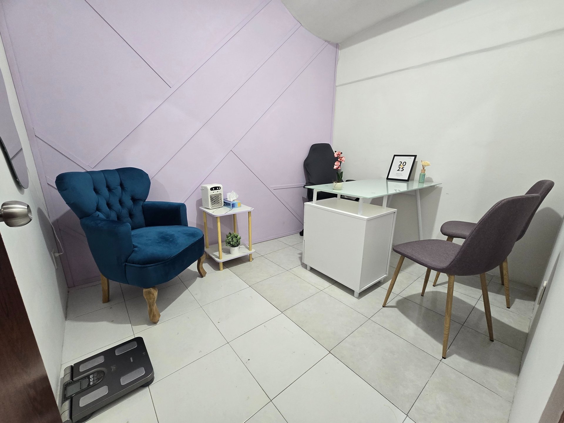 an abstract photo of a curved building with a blue sky in the background