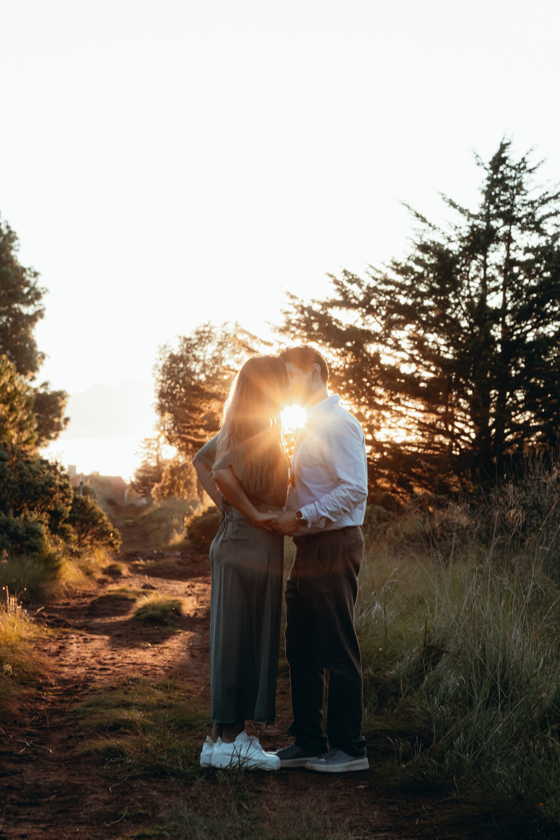 woman riding on back of man