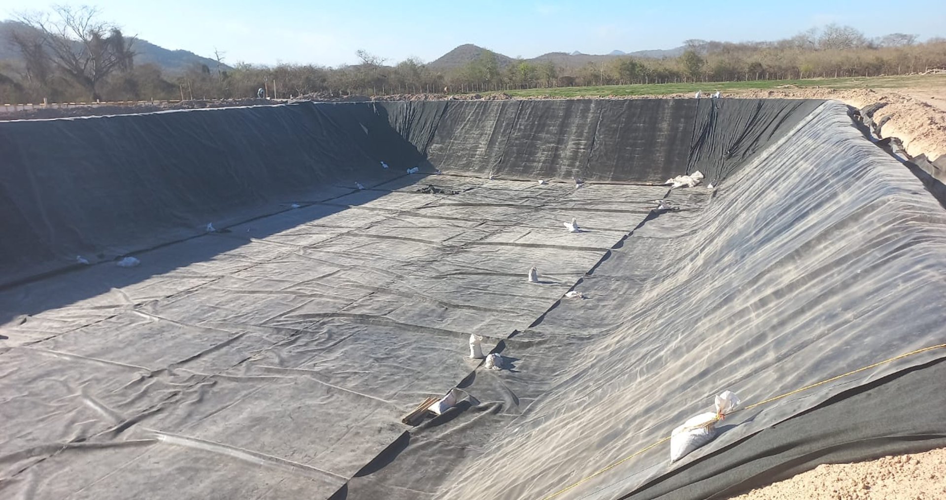 black and brown leather padded tub sofa