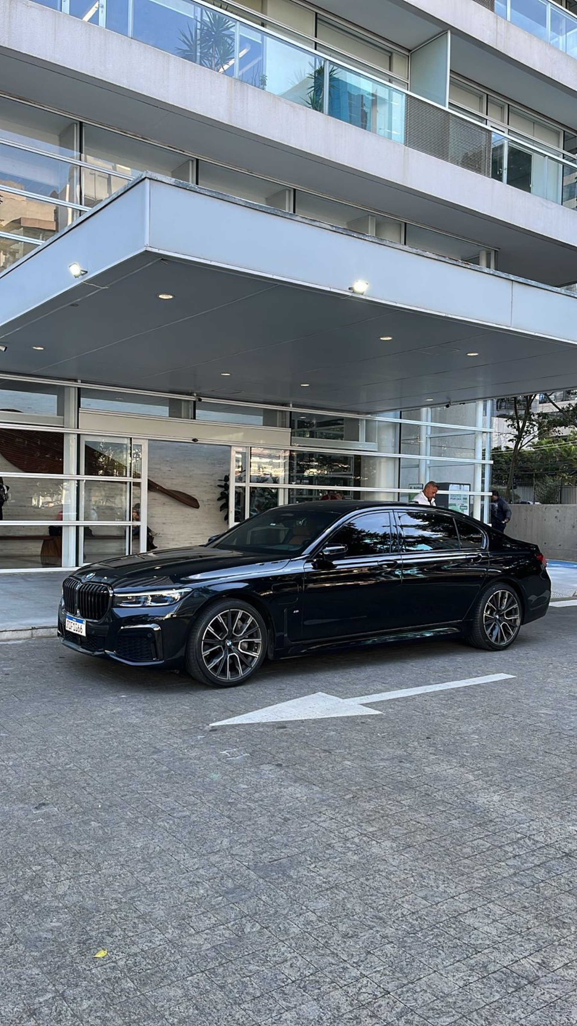 black and brown leather padded tub sofa