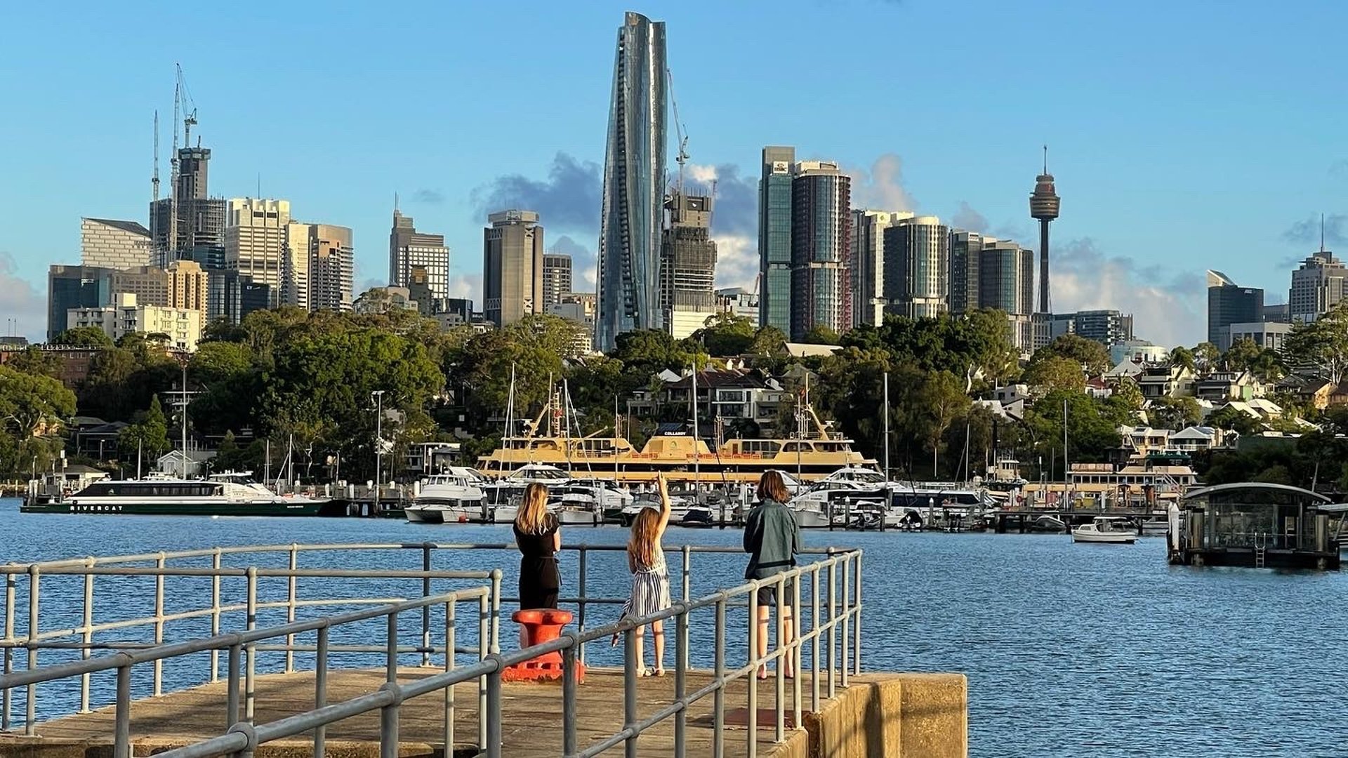 person holding camera lens