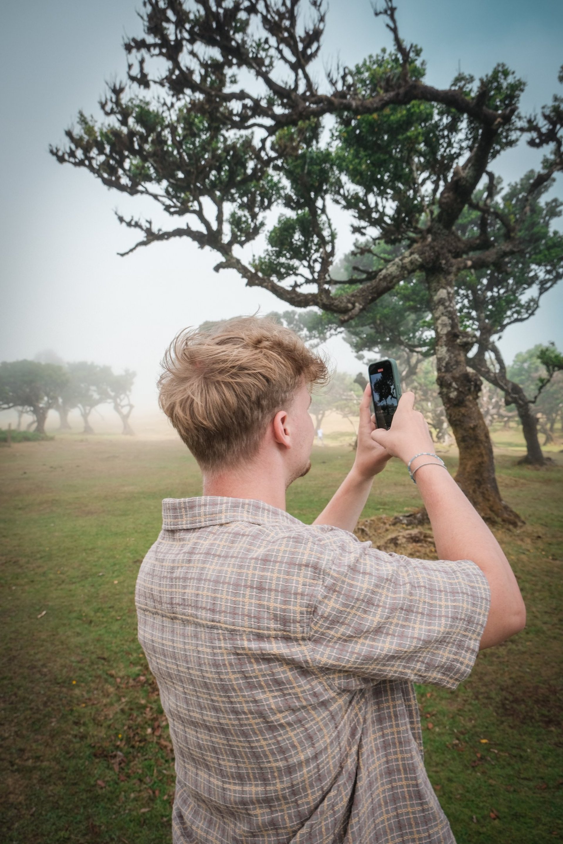 an abstract photo of a curved building with a blue sky in the background