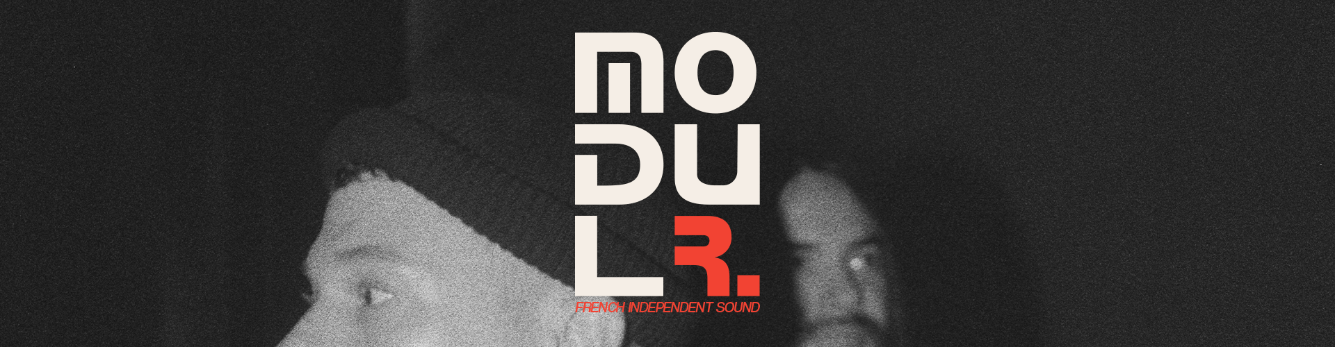 an abstract photo of a curved building with a blue sky in the background