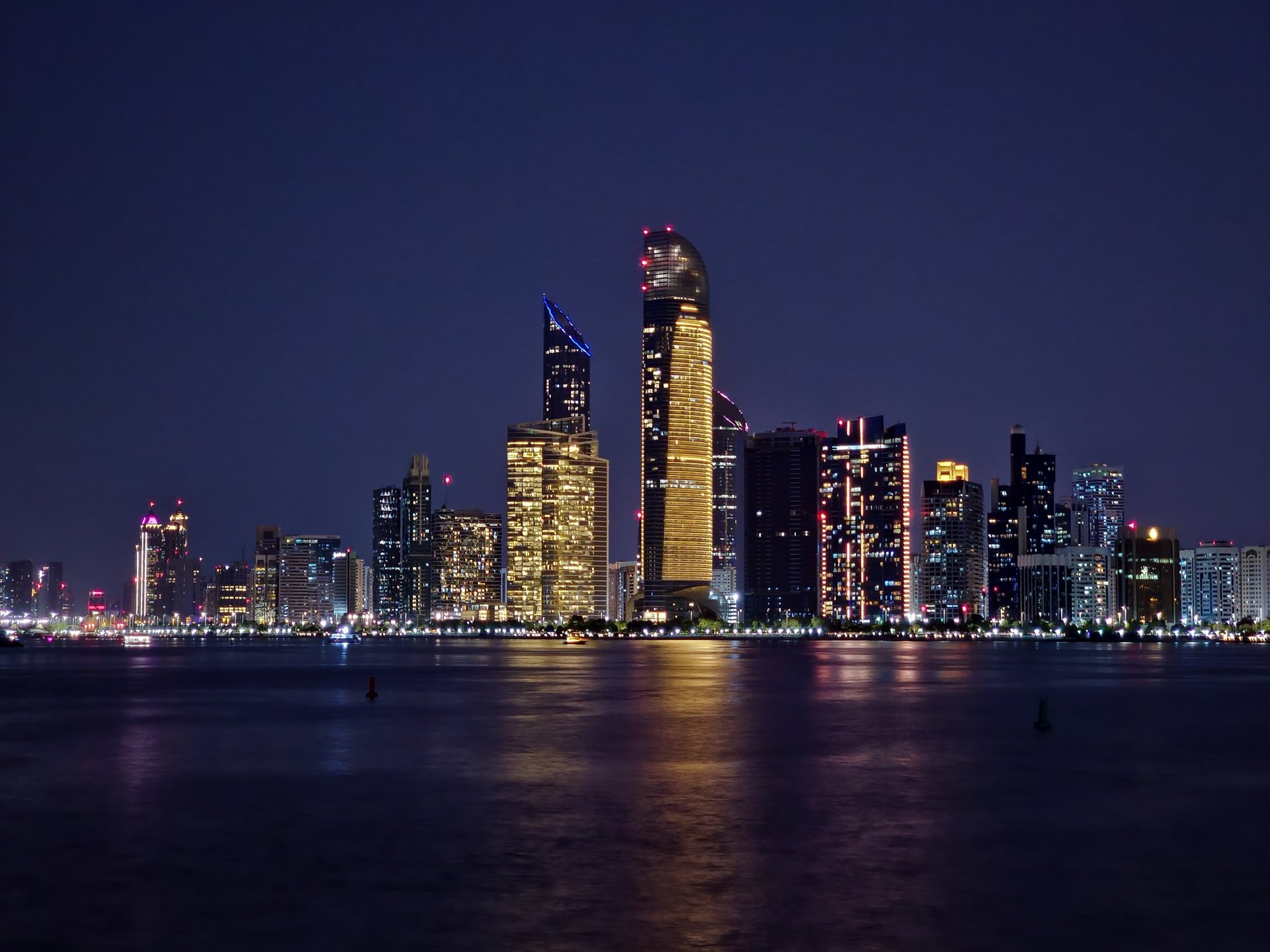 looking up at tall buildings in a city