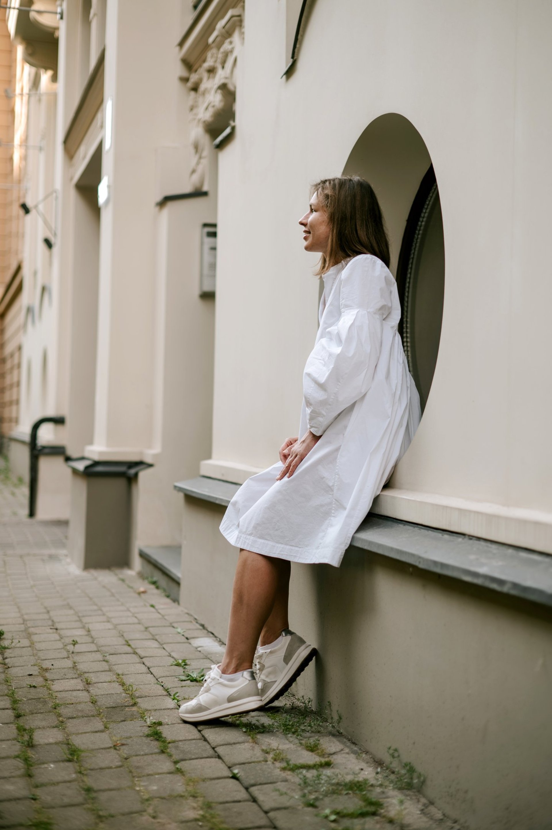 black and brown leather padded tub sofa