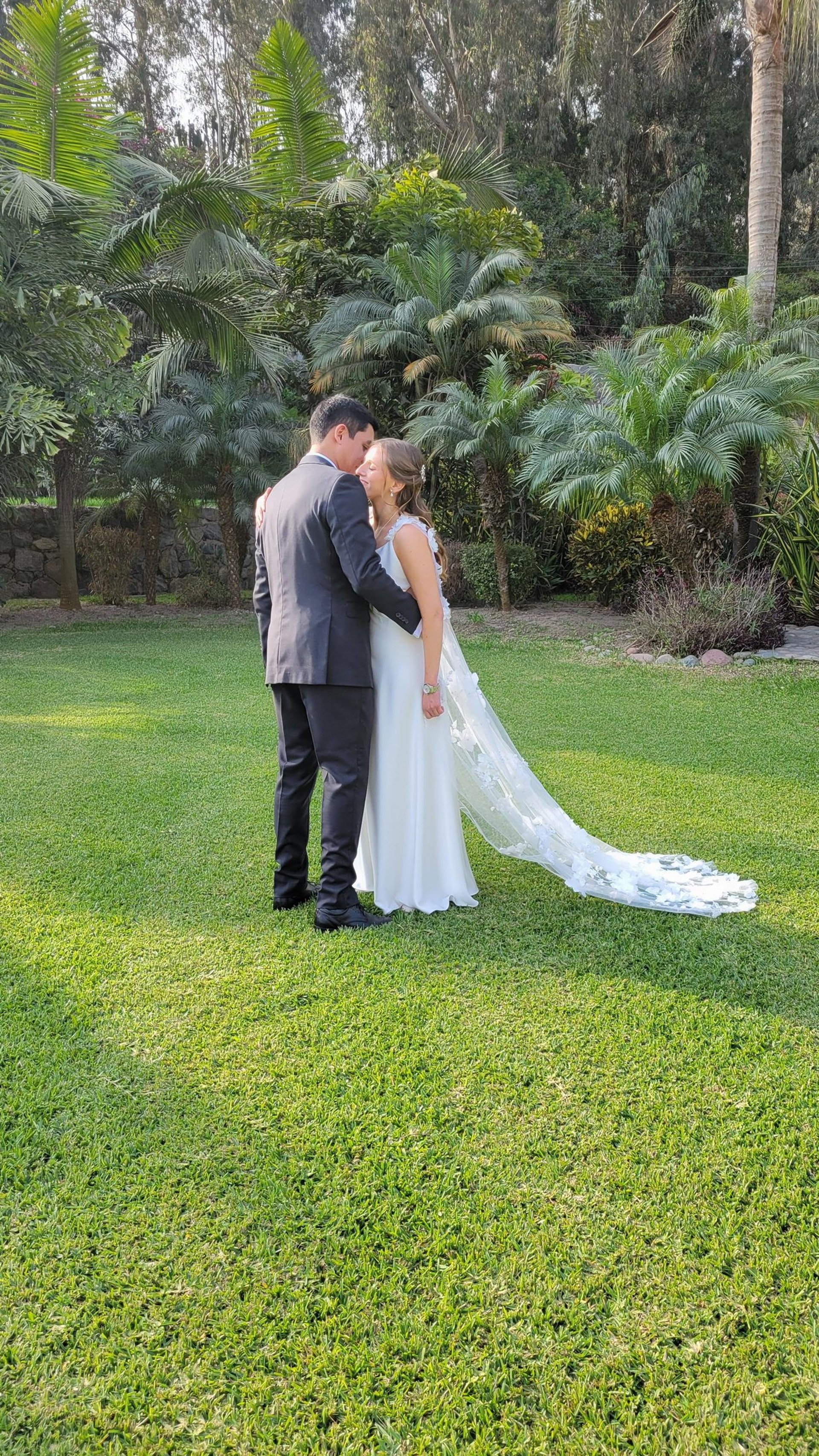 woman wearing yellow long-sleeved dress under white clouds and blue sky during daytime