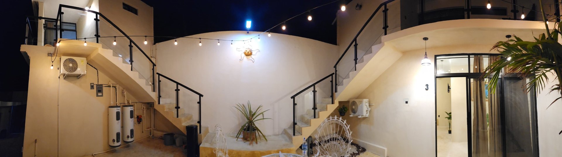 black and brown leather padded tub sofa