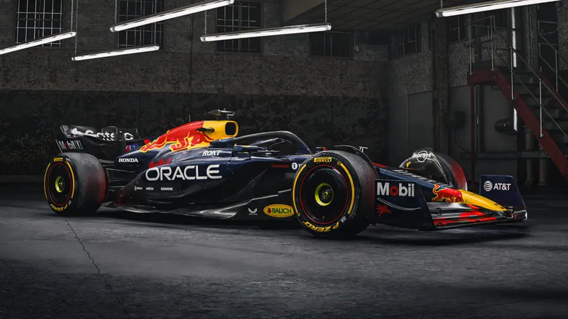 A race car is driving on the track.