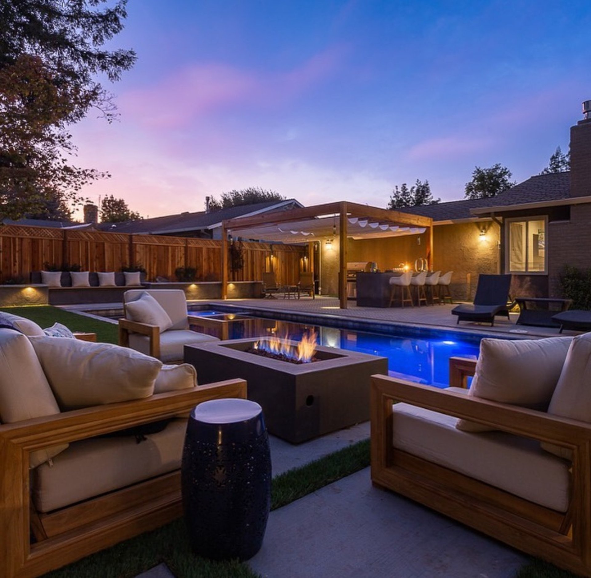 Atherton backyard renovation with raised garden planters and custom path layout