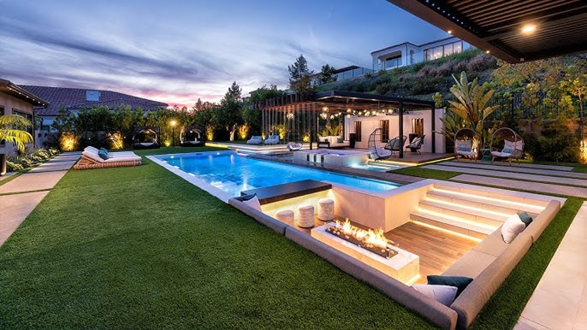 Luxury yard remodel in Atherton featuring drought-tolerant landscaping, custom patio, and outdoor living area