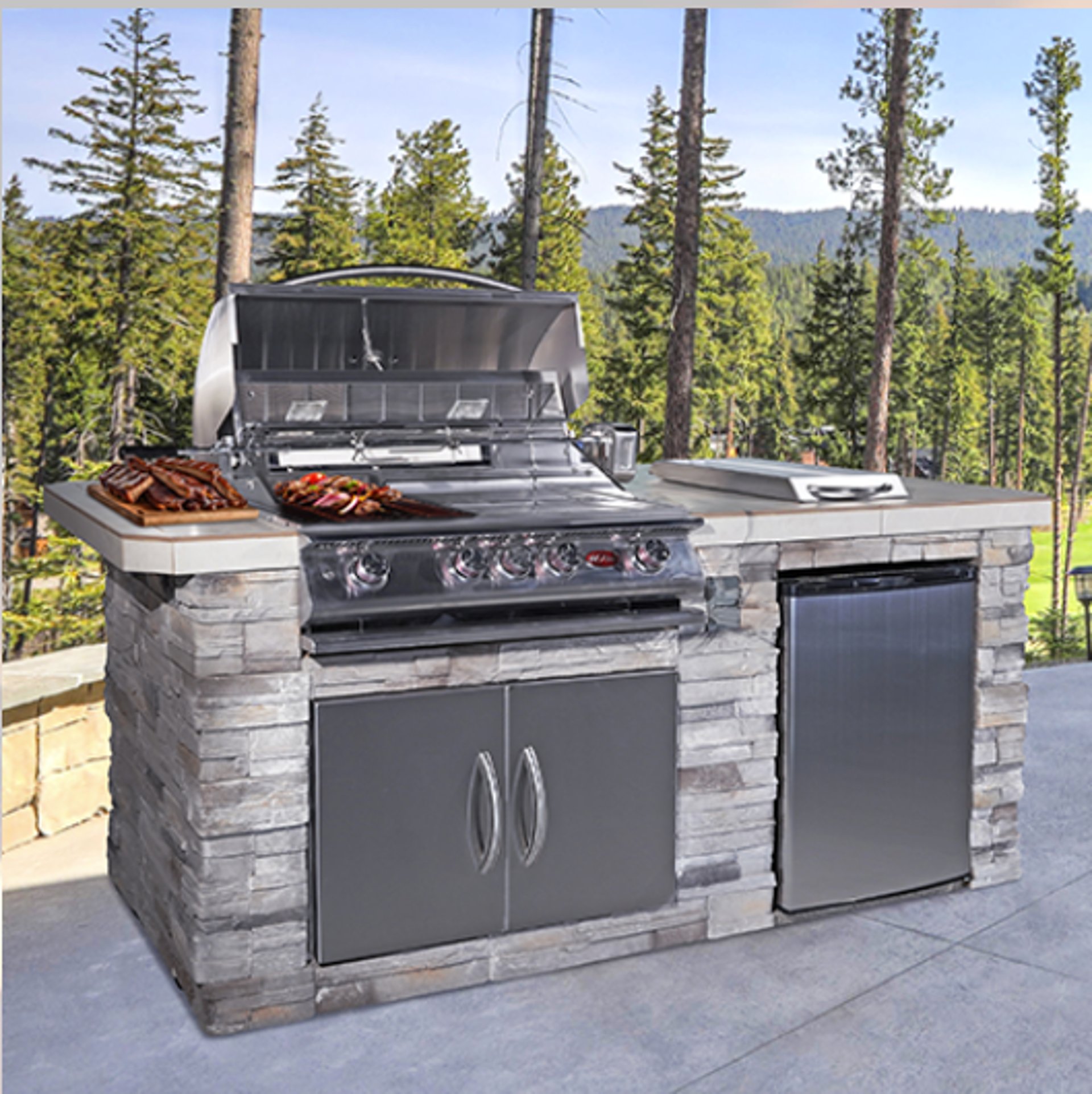 Luxury outdoor kitchen installation in Palo Alto with gas grill and under-counter fridge