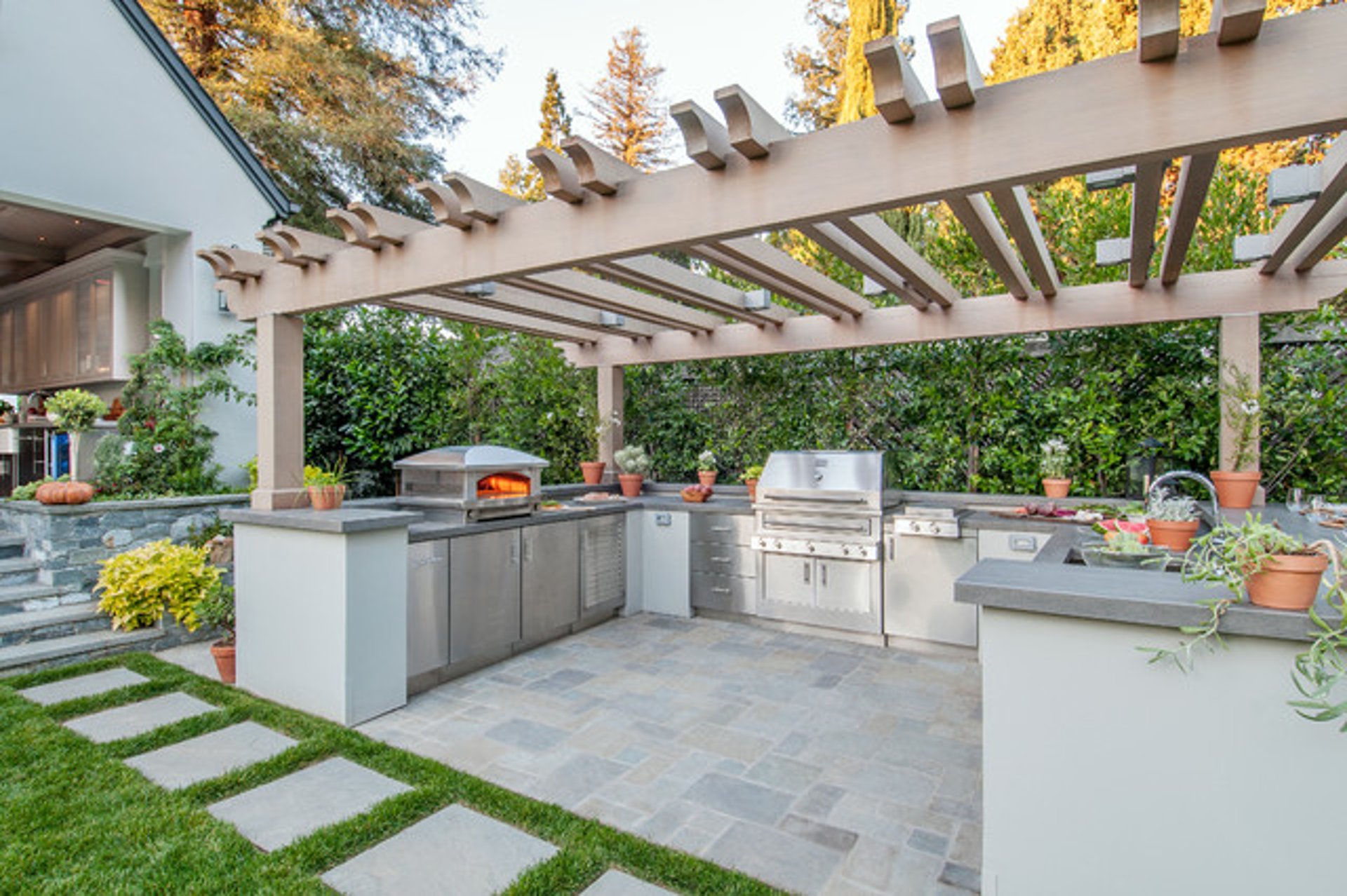 Custom outdoor kitchen in Palo Alto with pergola and built-in BBQ island