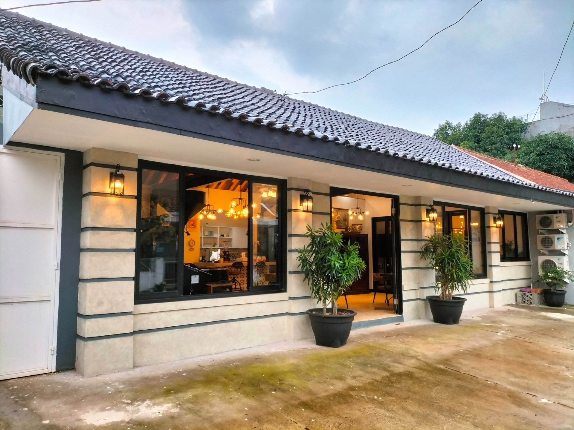 person wearing grey knit sweater