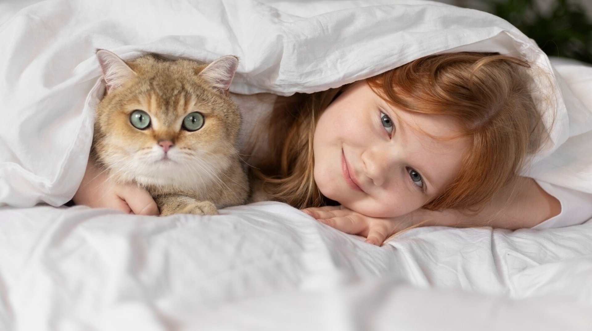shallow focus photography of baby beside woman