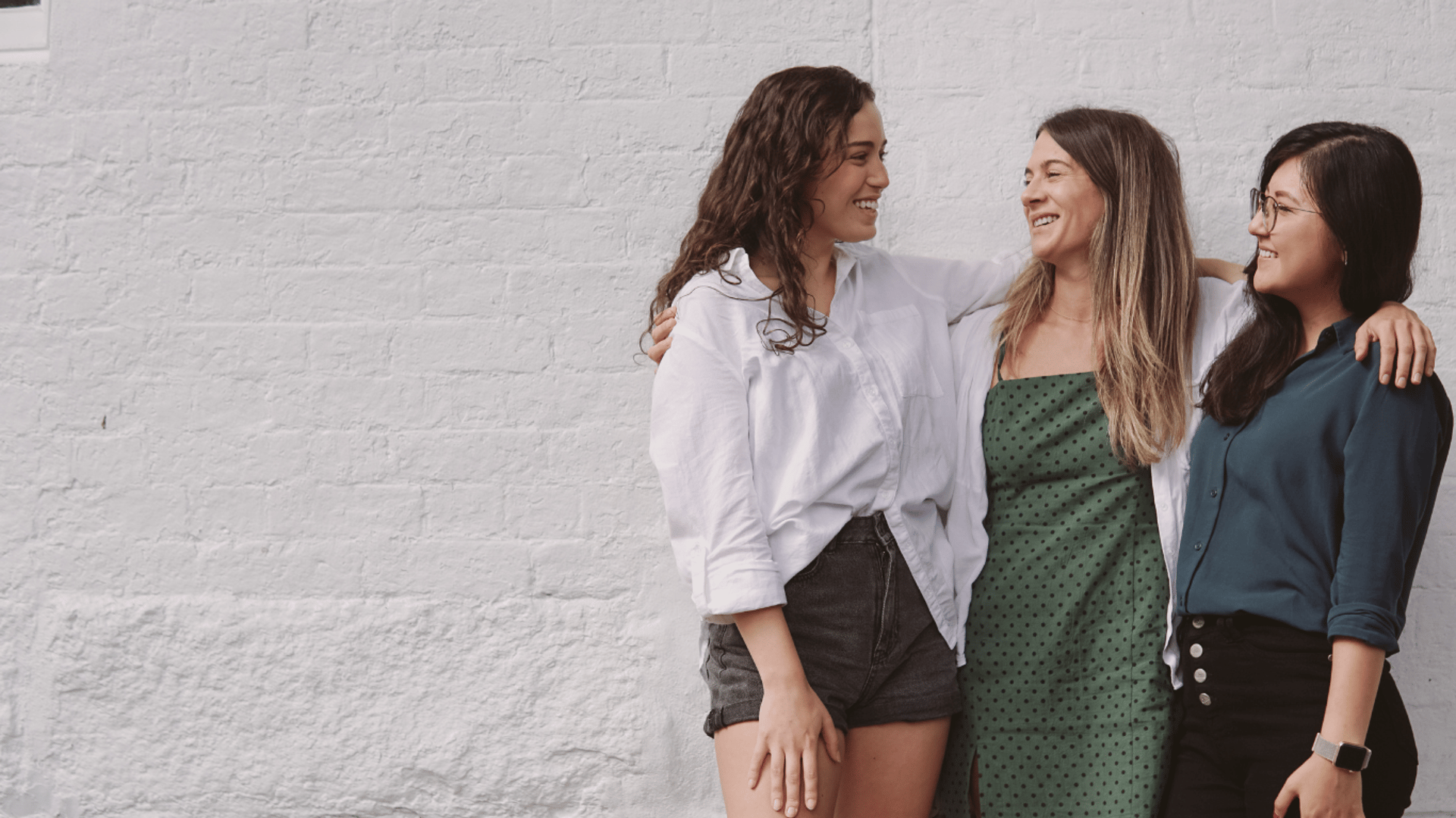 an abstract photo of a curved building with a blue sky in the background